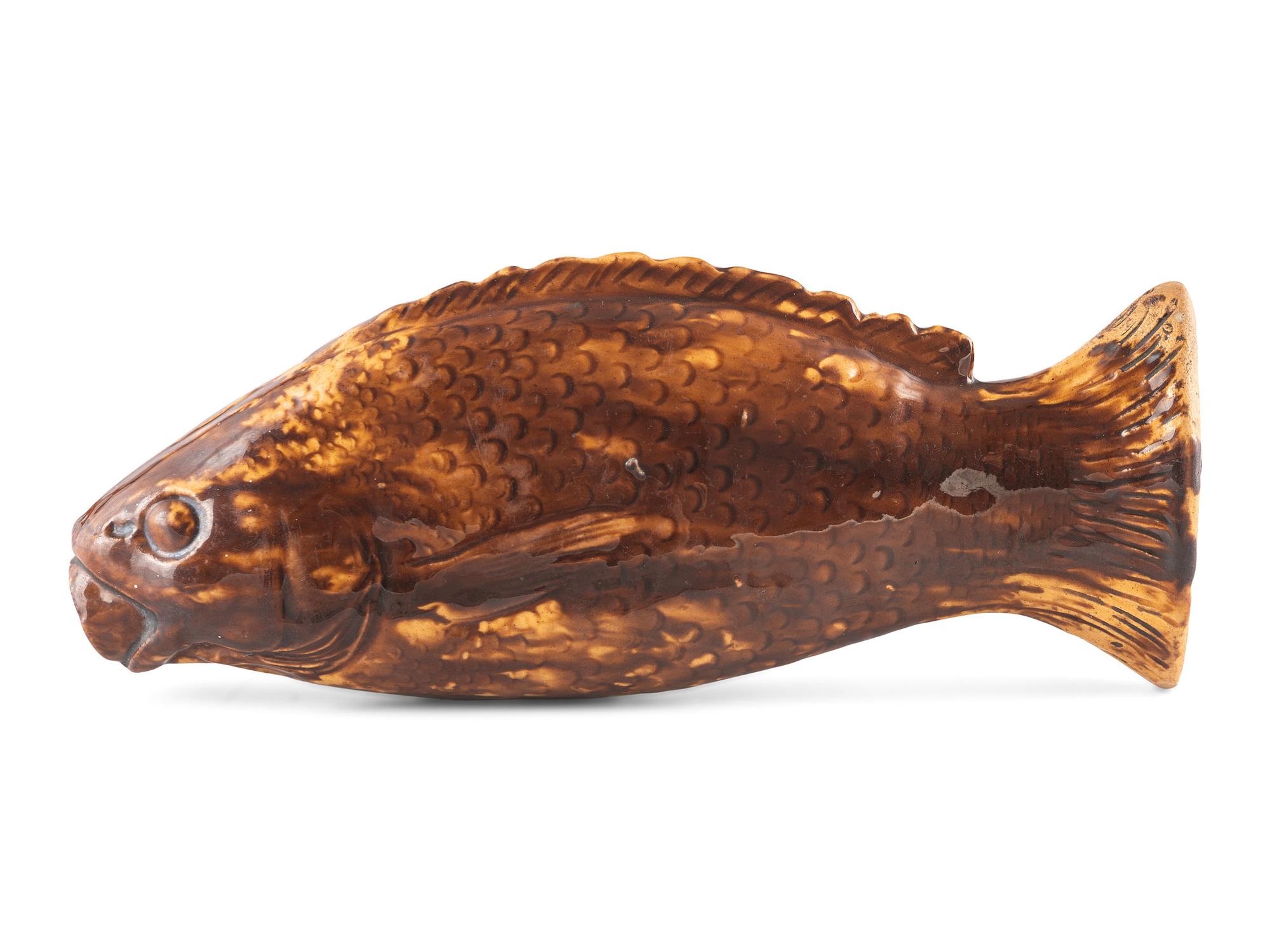 A Yellowware Rockingham Glaze Fish Flask