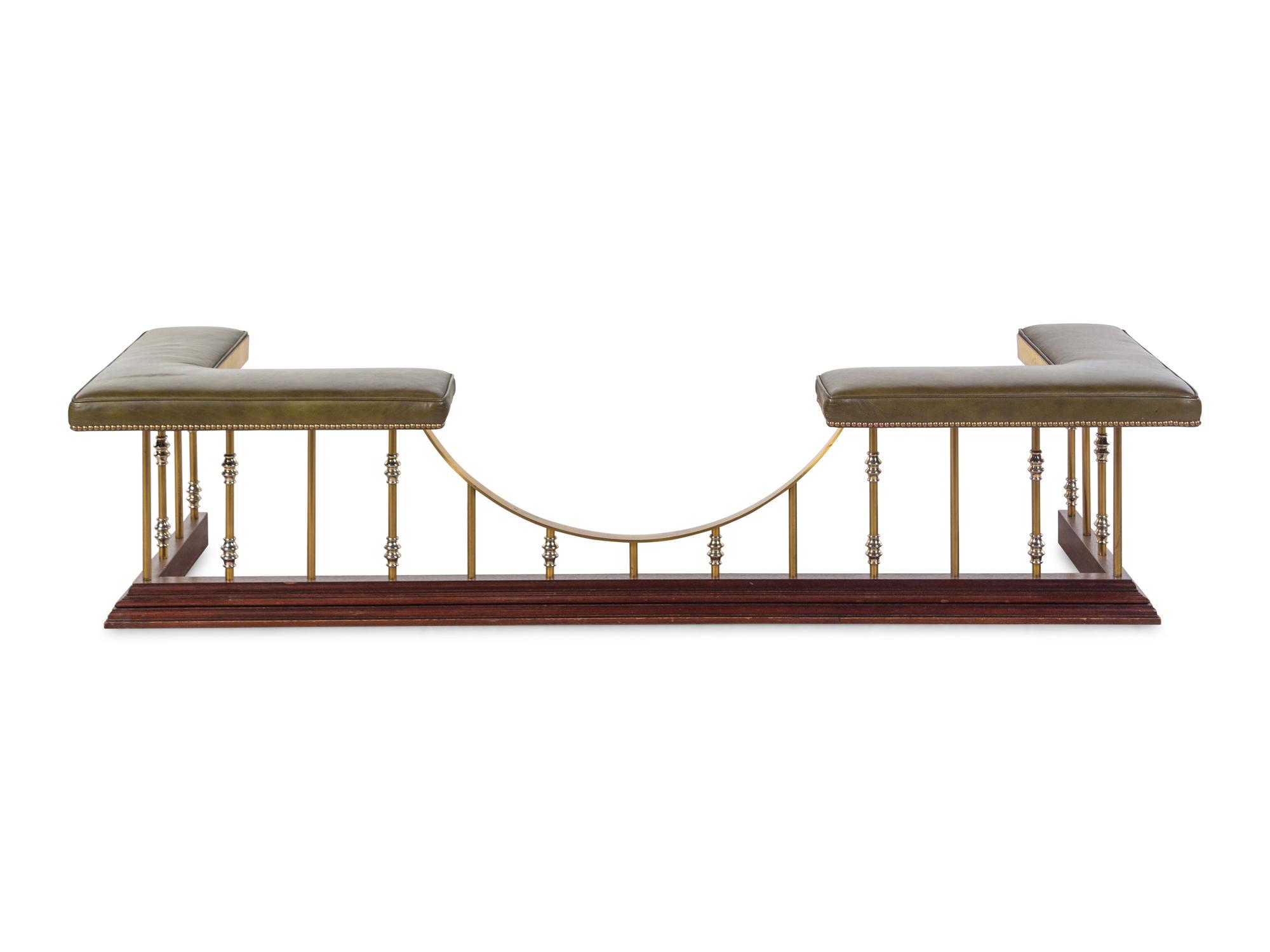 A Brass and Vinyl Upholstered Leather Club Fender