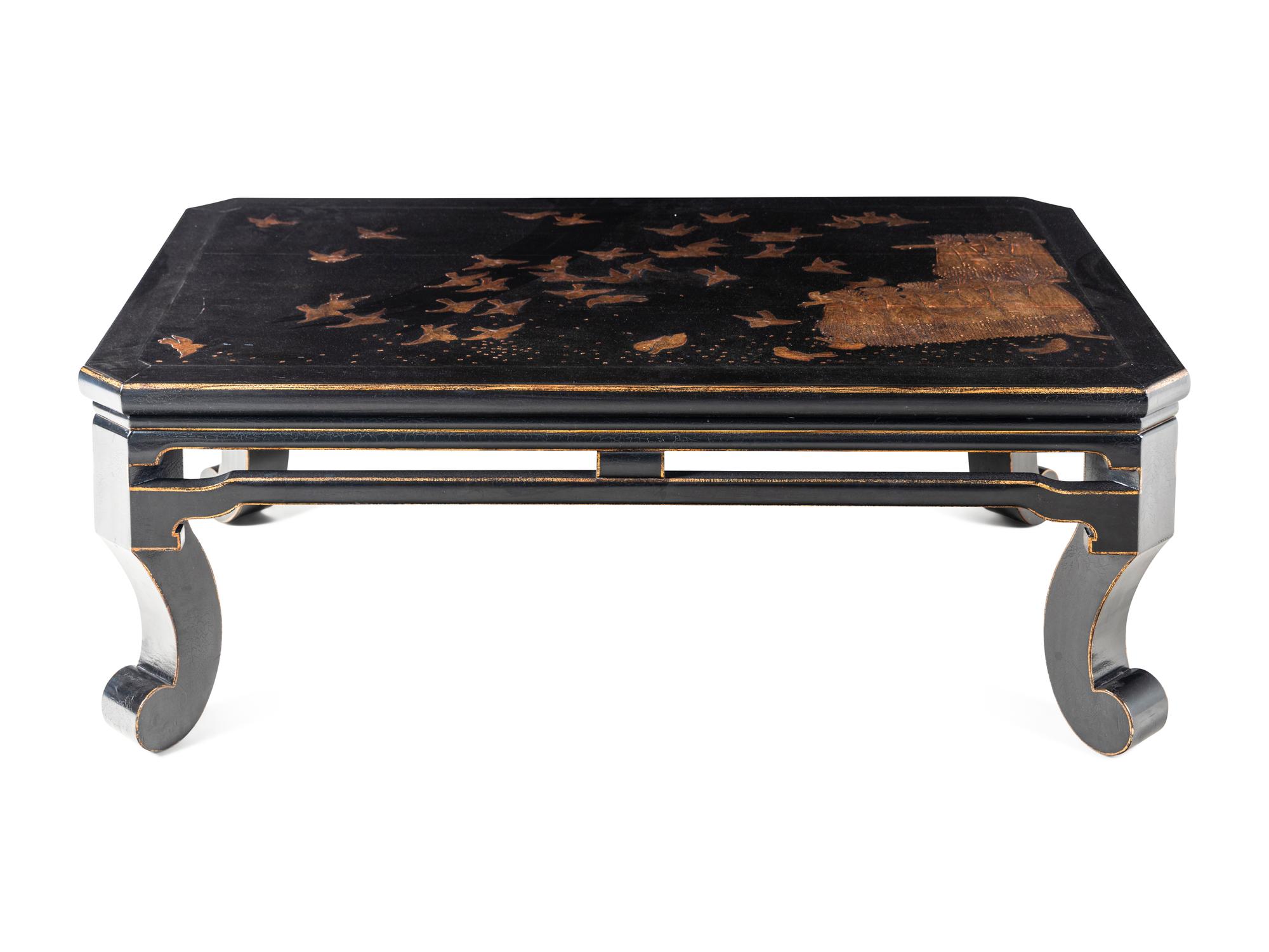 A Contemporary Black and Gilt Painted Low Table