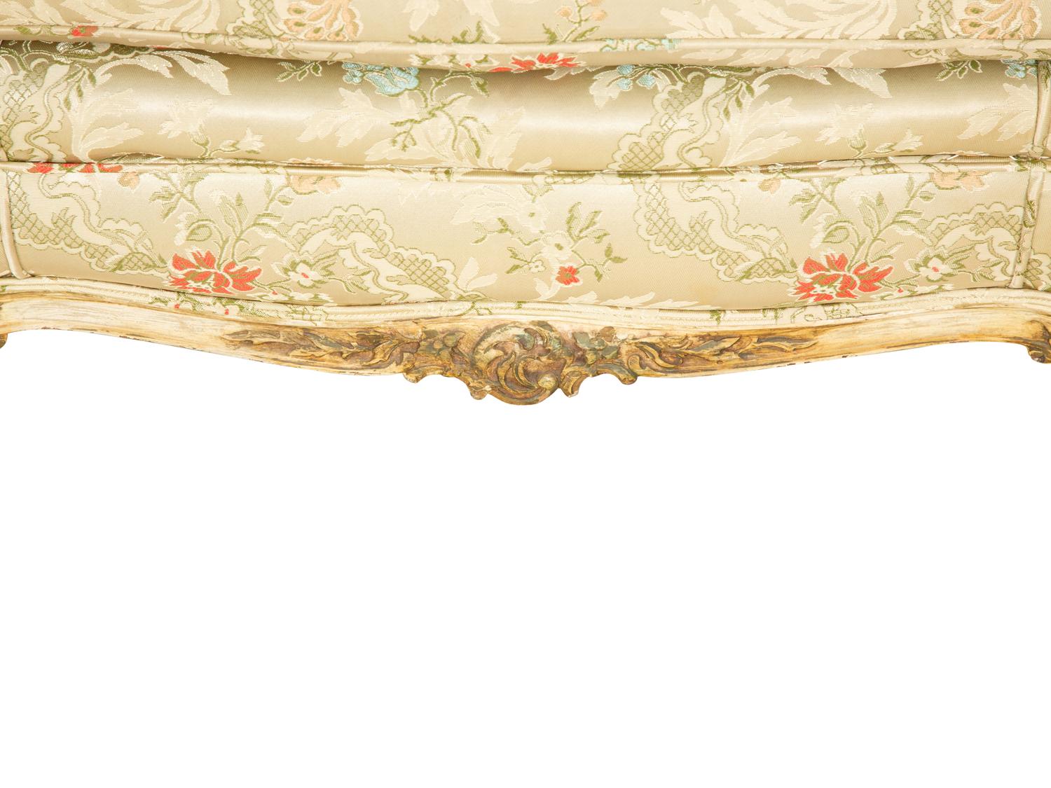 A Louis XV Style Painted and Parcel Gilt Sofa