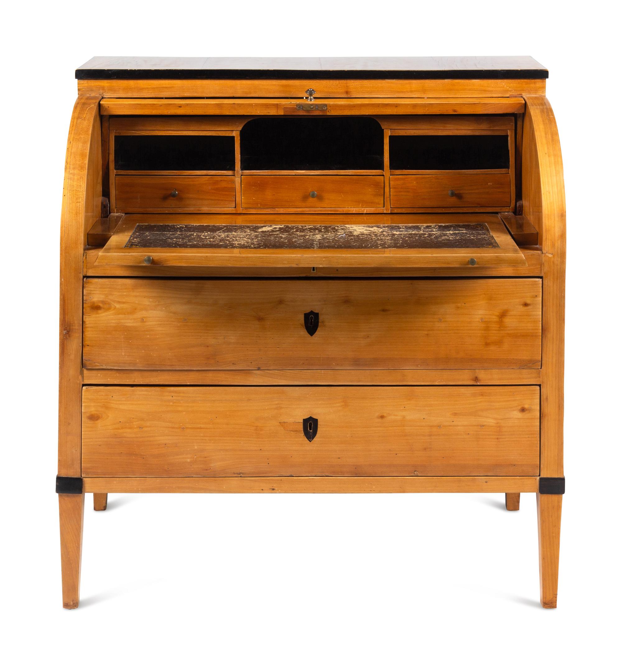 A Biedermeier Part-Ebonized Birch Cylinder Bureau