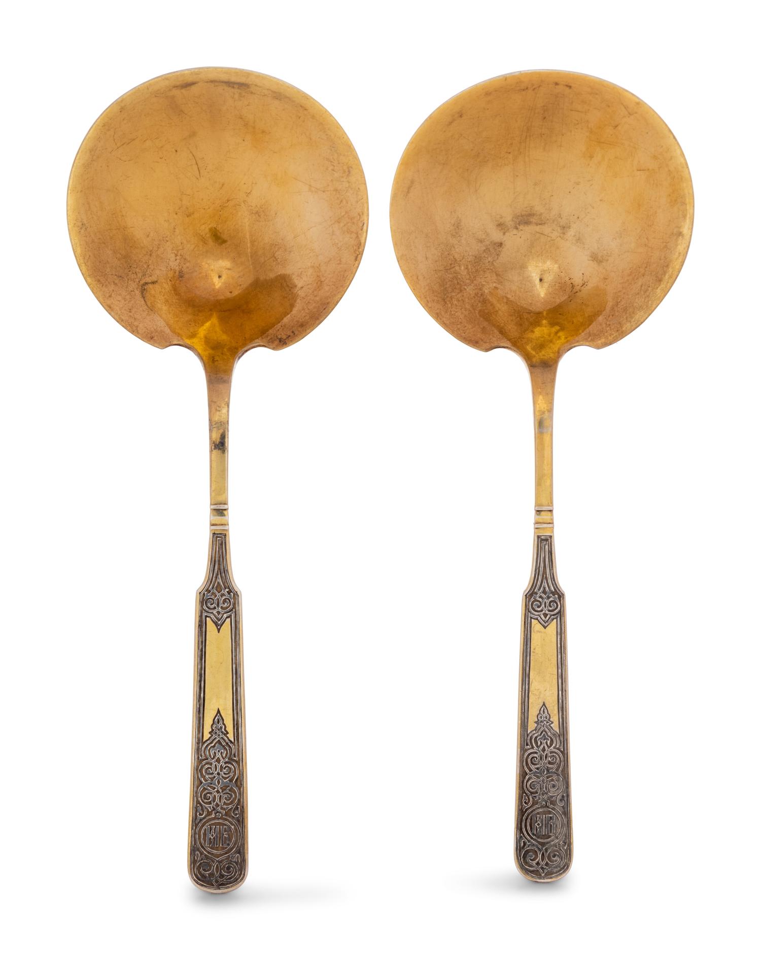 A Pair of Russian Niello Silver-Gilt Serving Spoons