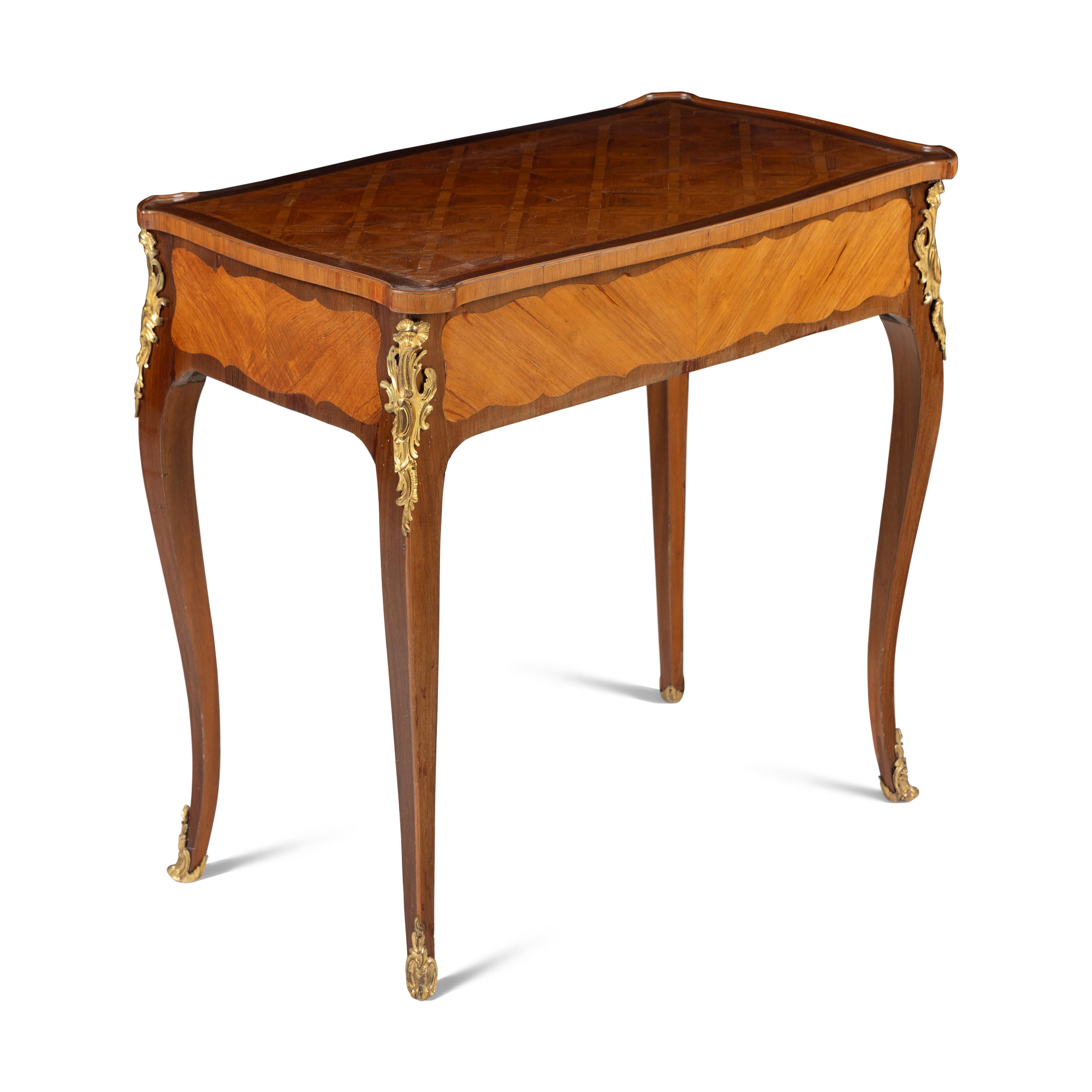 A Louis XV/XVI Transitional Gilt Bronze Mounted Amaranth, Tulipwood and Parquetry Table à Écrire