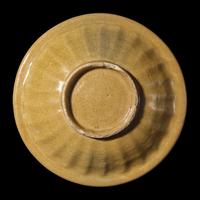 A 'Golden Longquan' or 'Beishoku' Double-Fish Dish, Southern Song to Yuan Dynasty 南宋-元 龍泉窯 米黃釉雙魚洗