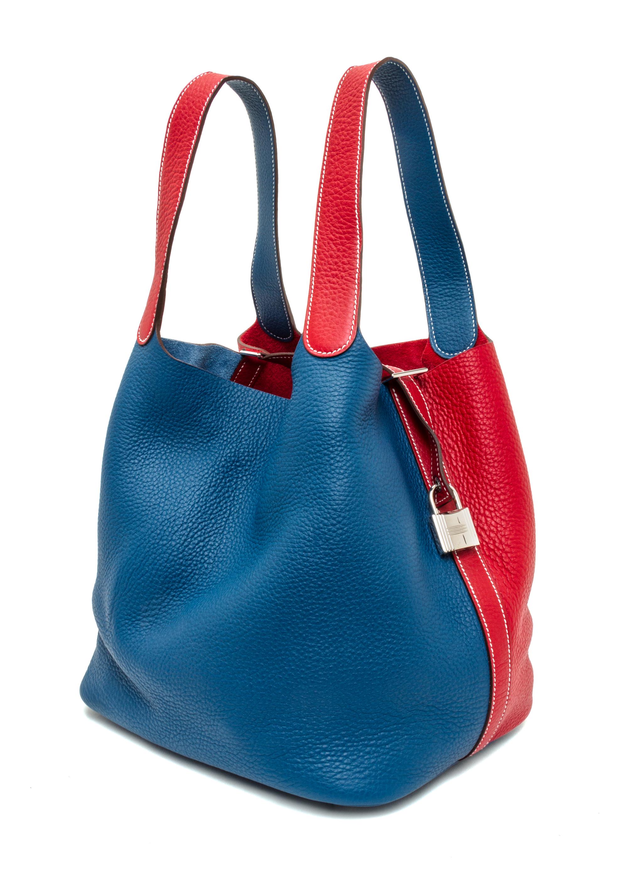 An Hermes Rouge Casaque and Bleu Taurillon Clemence Picotin Lock GM Handbag, 10.5" x 10.5" x 8.5".