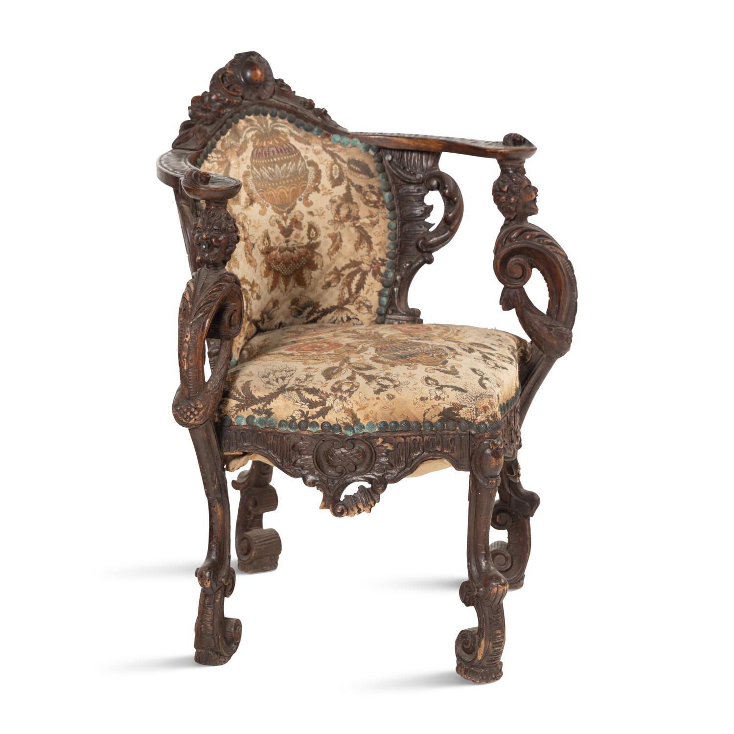 An Italian Carved Walnut Corner Chair