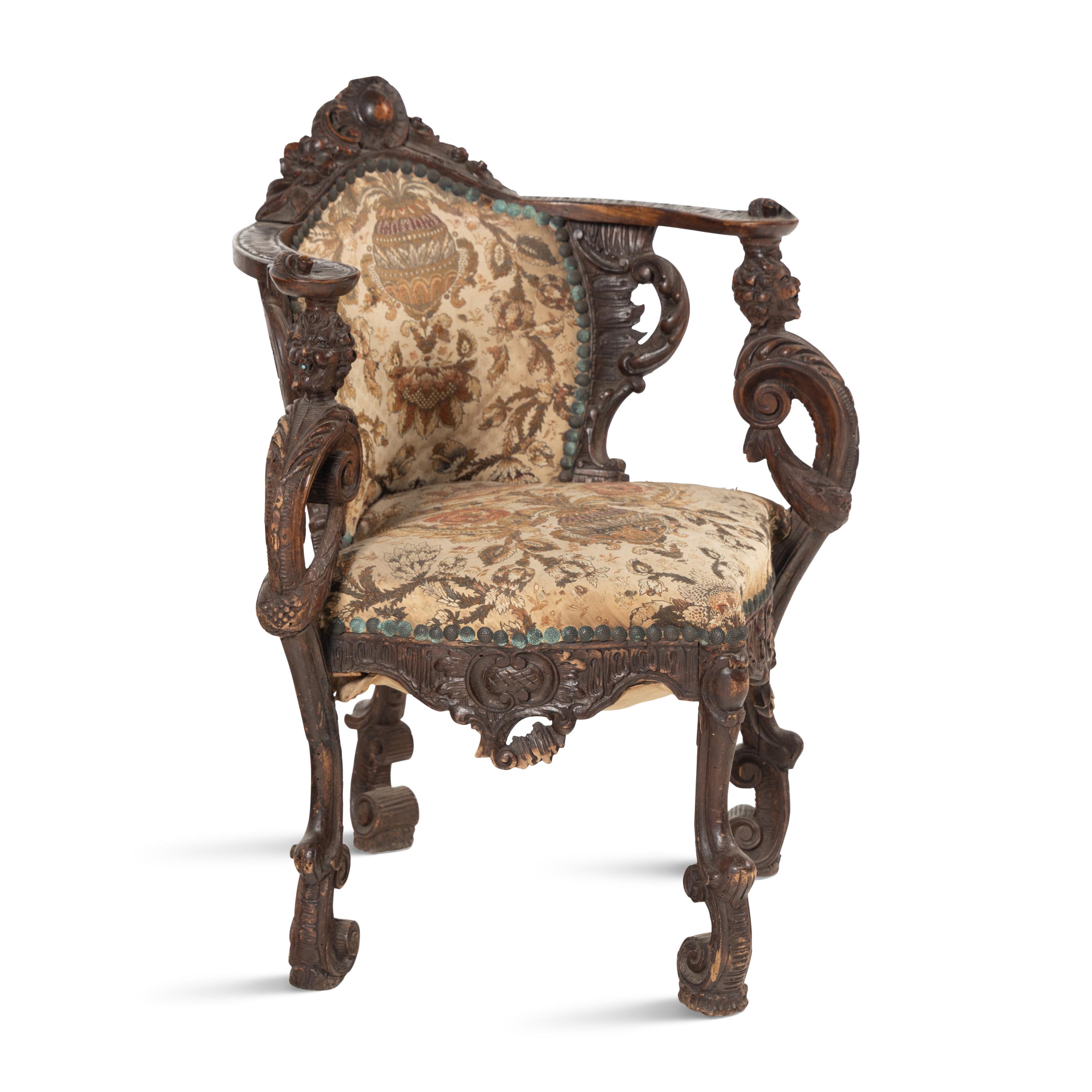 An Italian Carved Walnut Corner Chair