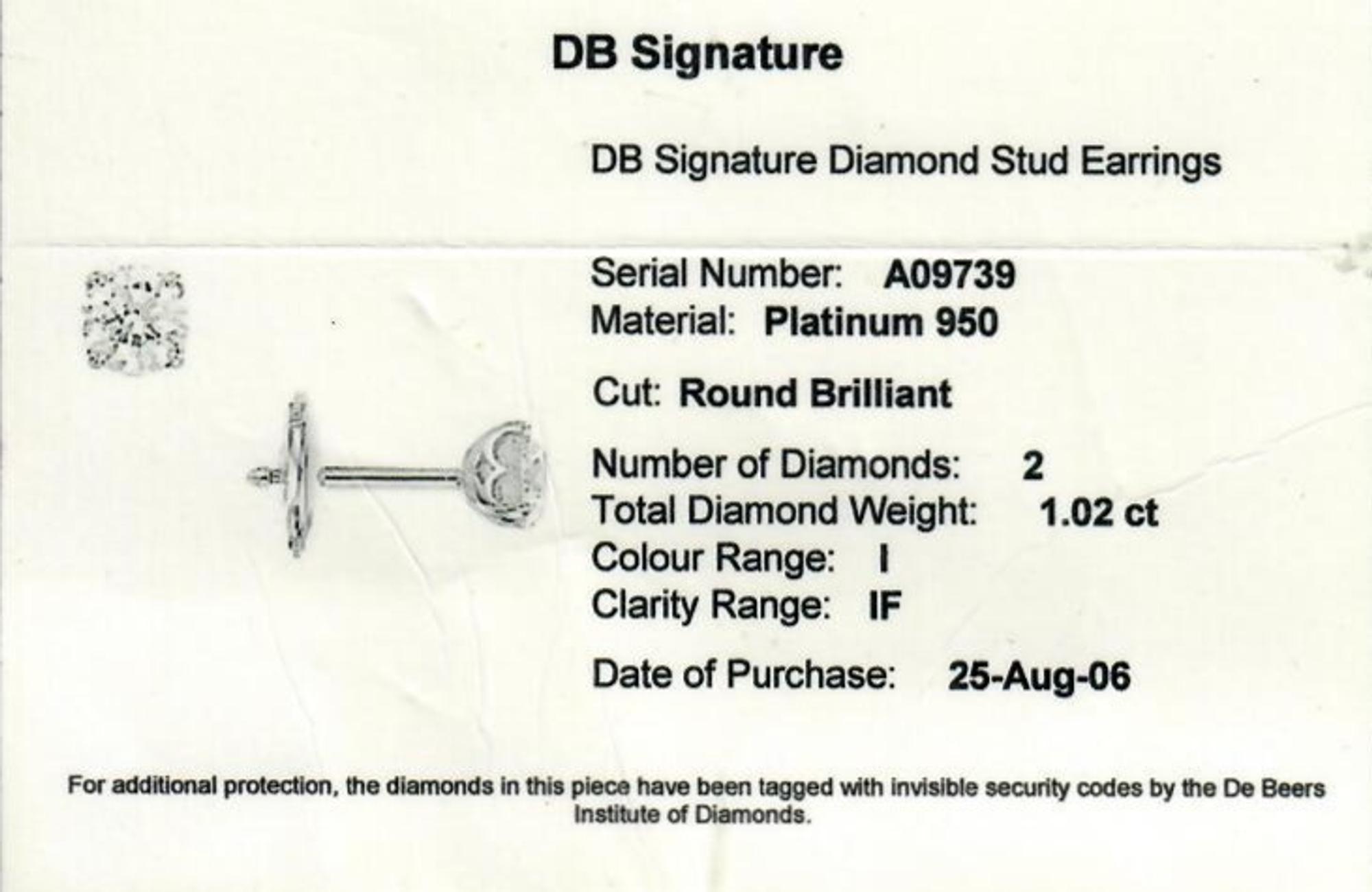 A Pair of Platinum and Diamond 'DB Signature' Stud Earrings, De Beers, 1.35 dwts.