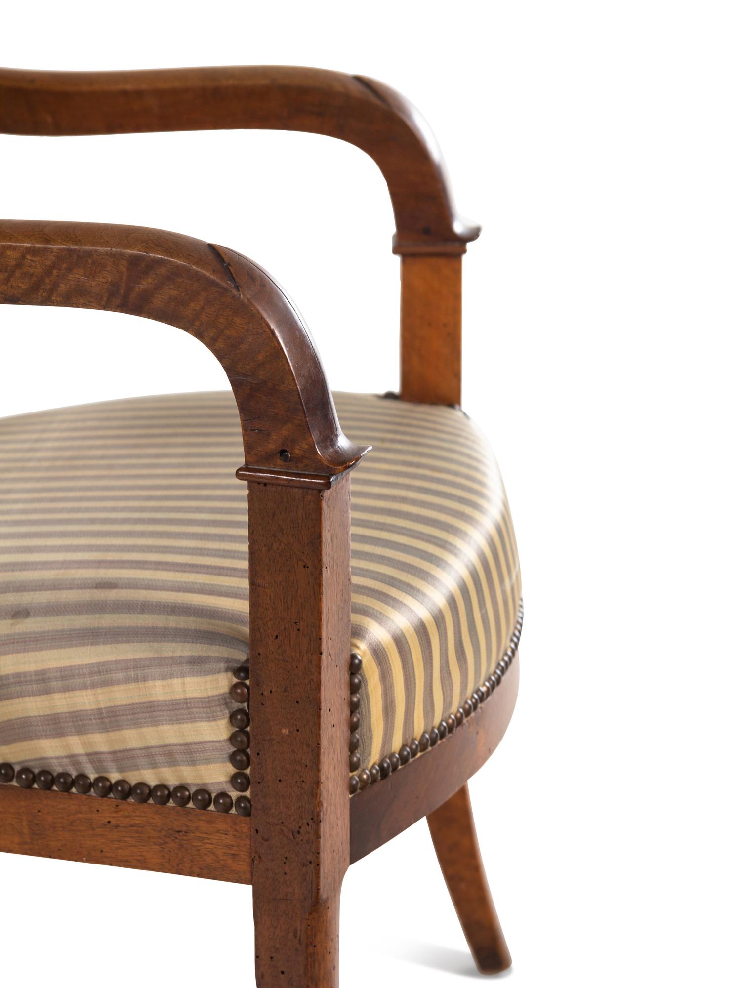 A Pair of Louis Philippe Walnut Fauteuils