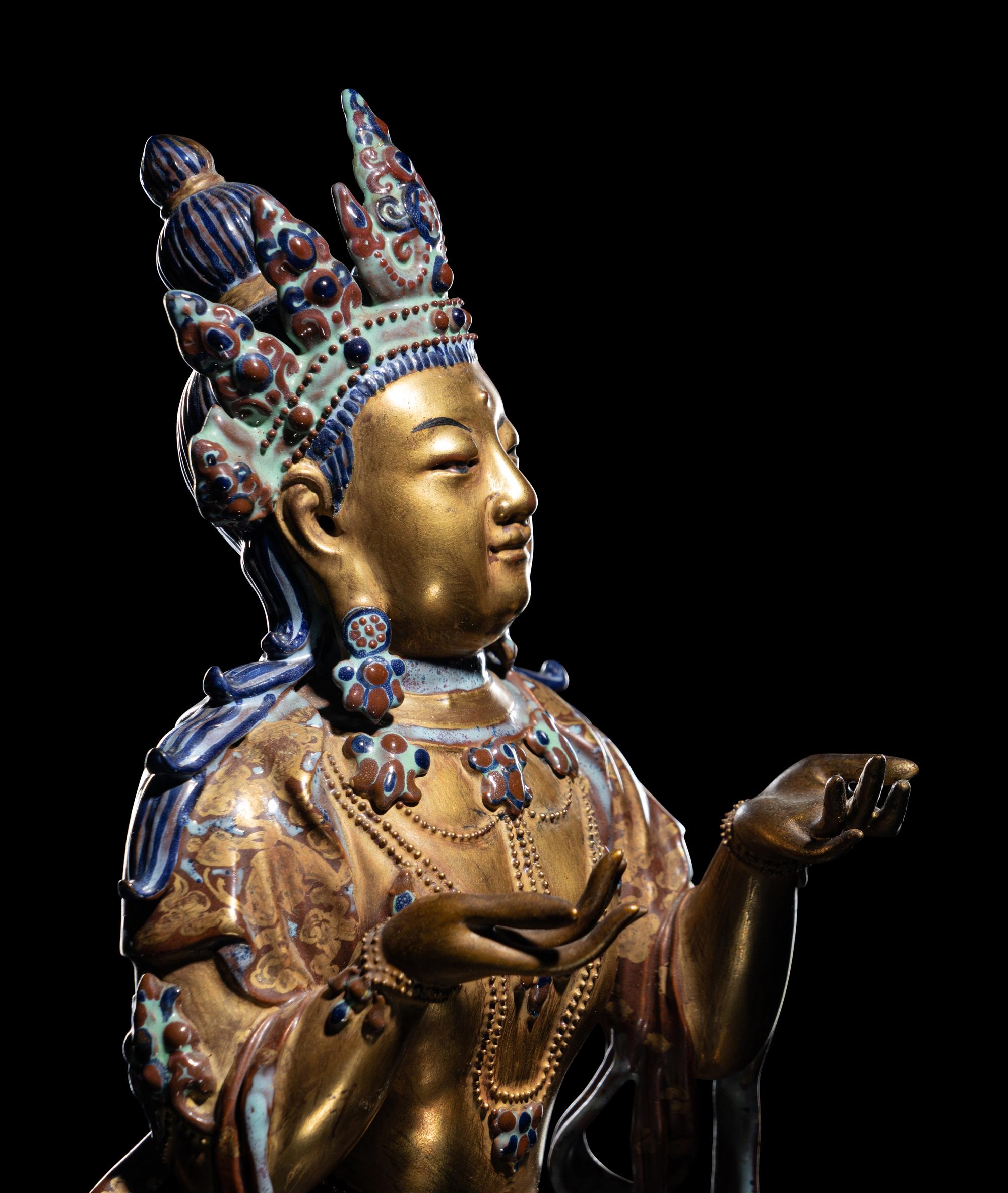 A Gilt Decorated Robin's Egg Glazed Porcelain Figure of Guanyin