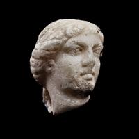 A Roman Marble Head of a Goddess