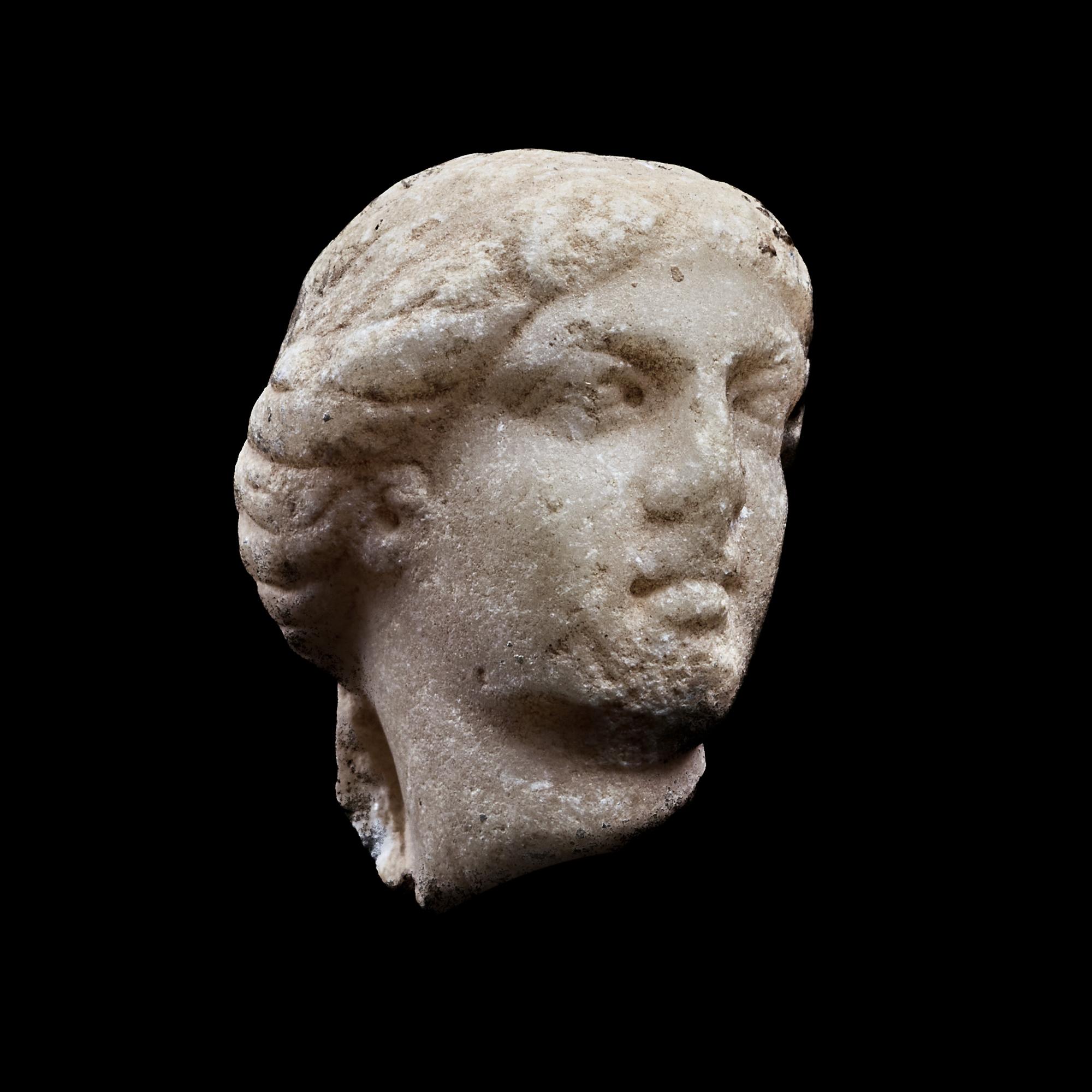 A Roman Marble Head of a Goddess