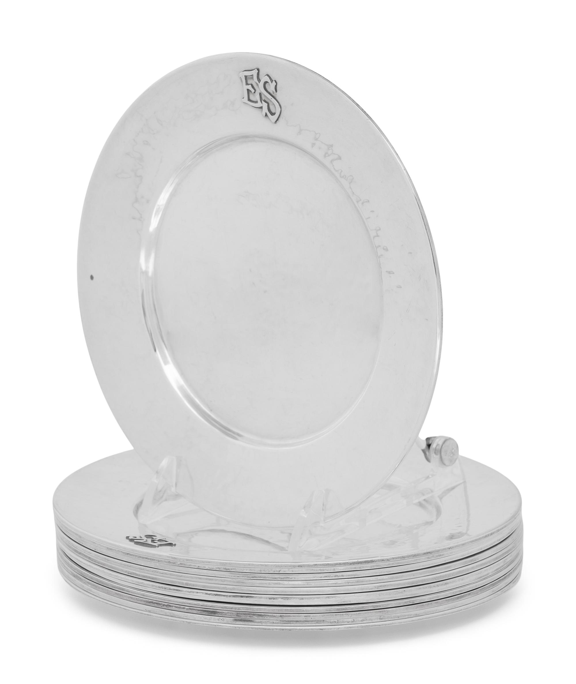 A Set of Twelve American Arts and Crafts Silver Bread Plates