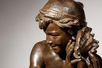 Jean-Baptiste Carpeaux (French, 1827-1875) | 19th Century | Le jeune pêcheur à la coquille | bronze | signed JB Carpeaux and with Propriété Carpeaux stamp | Height 35 1/2 x width 15 5/8 x depth 18 5/8 inches.