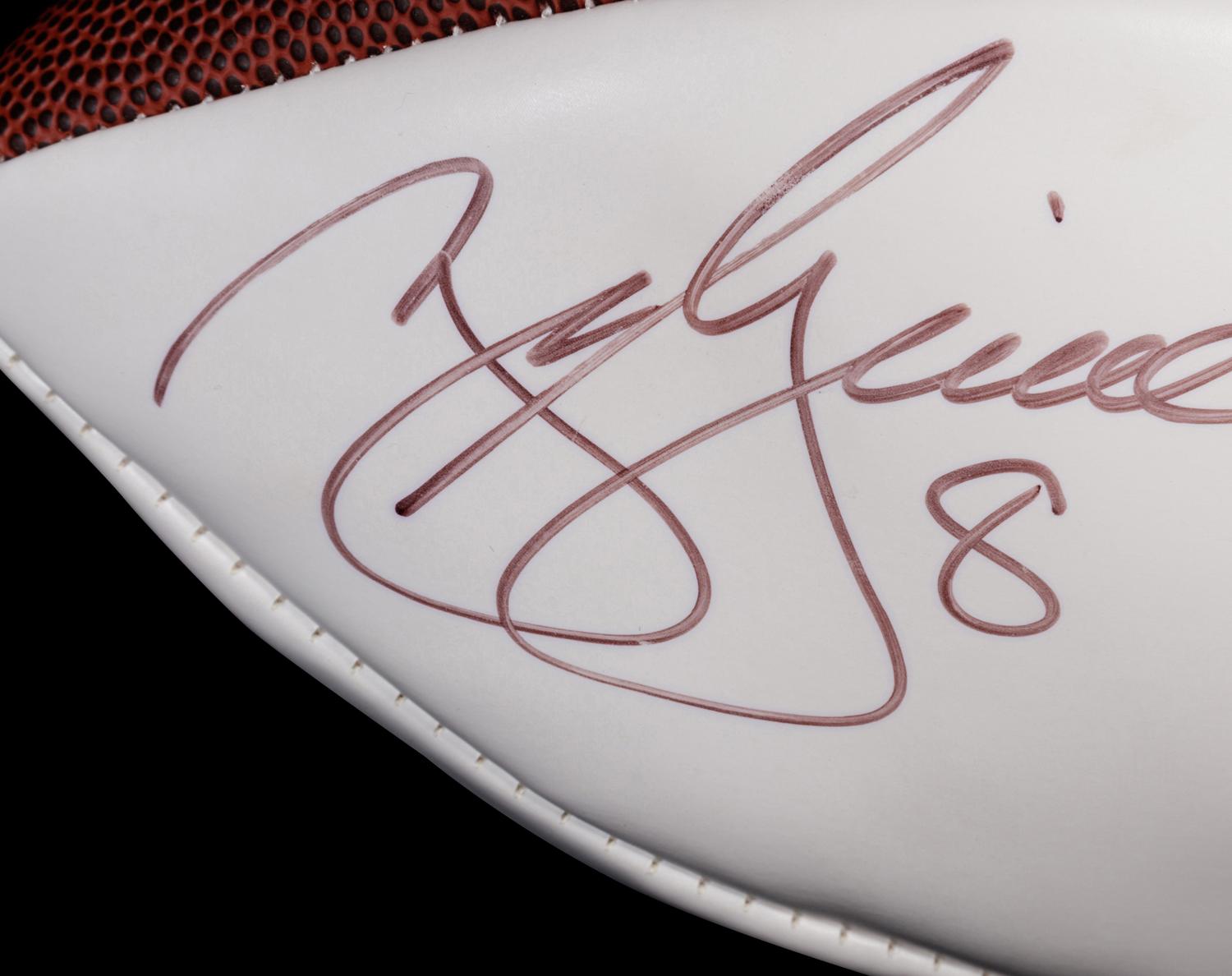 A Group of Denver Broncos Items (Including Tim Tebow),