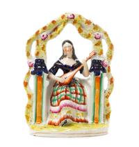 A Staffordshire Figural Group Height 9 1/2 inches. — 19TH CENTURY