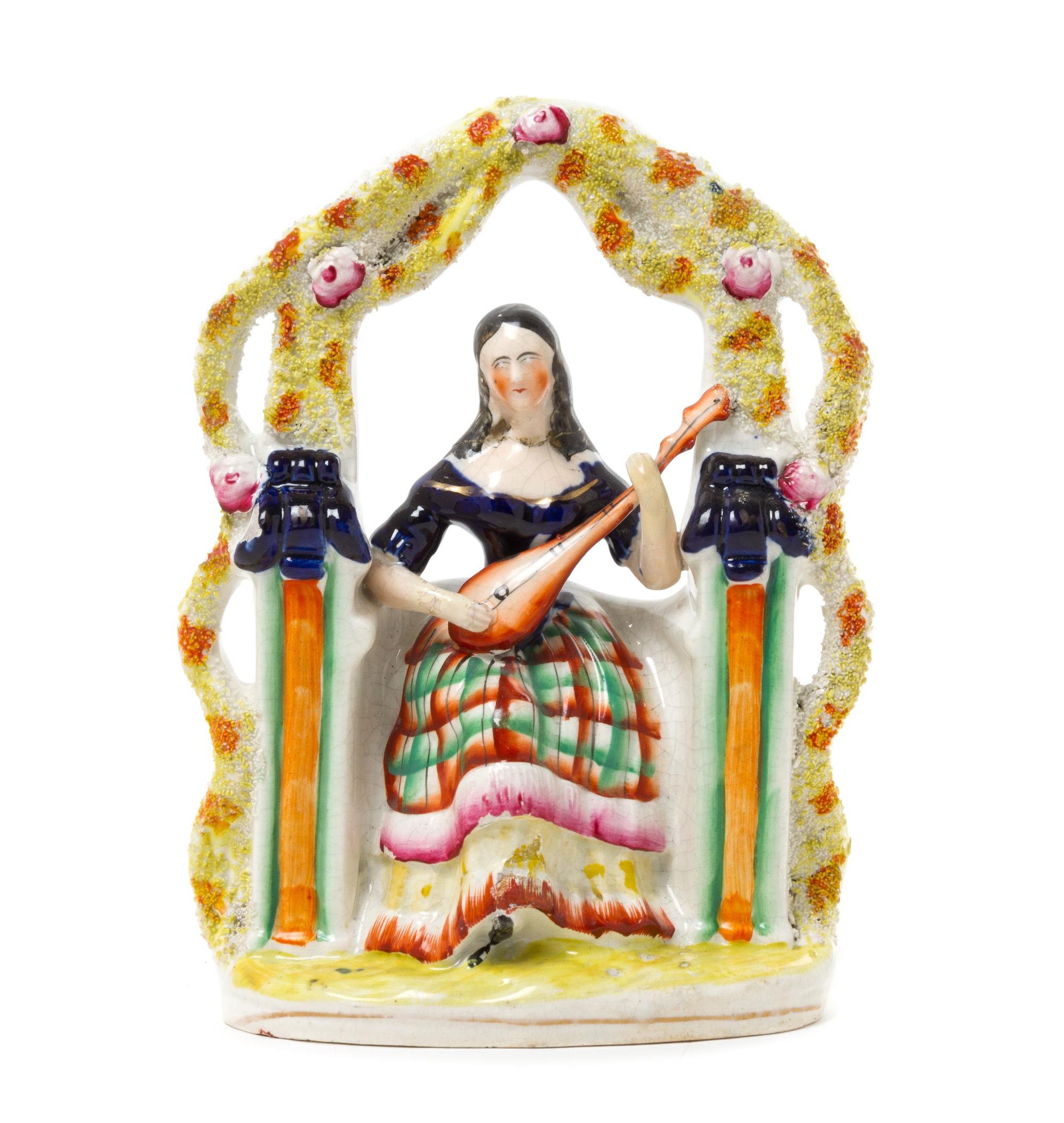 A Staffordshire Figural Group Height 9 1/2 inches. — 19TH CENTURY