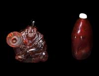 Two Chinese Amber Snuff Bottles
