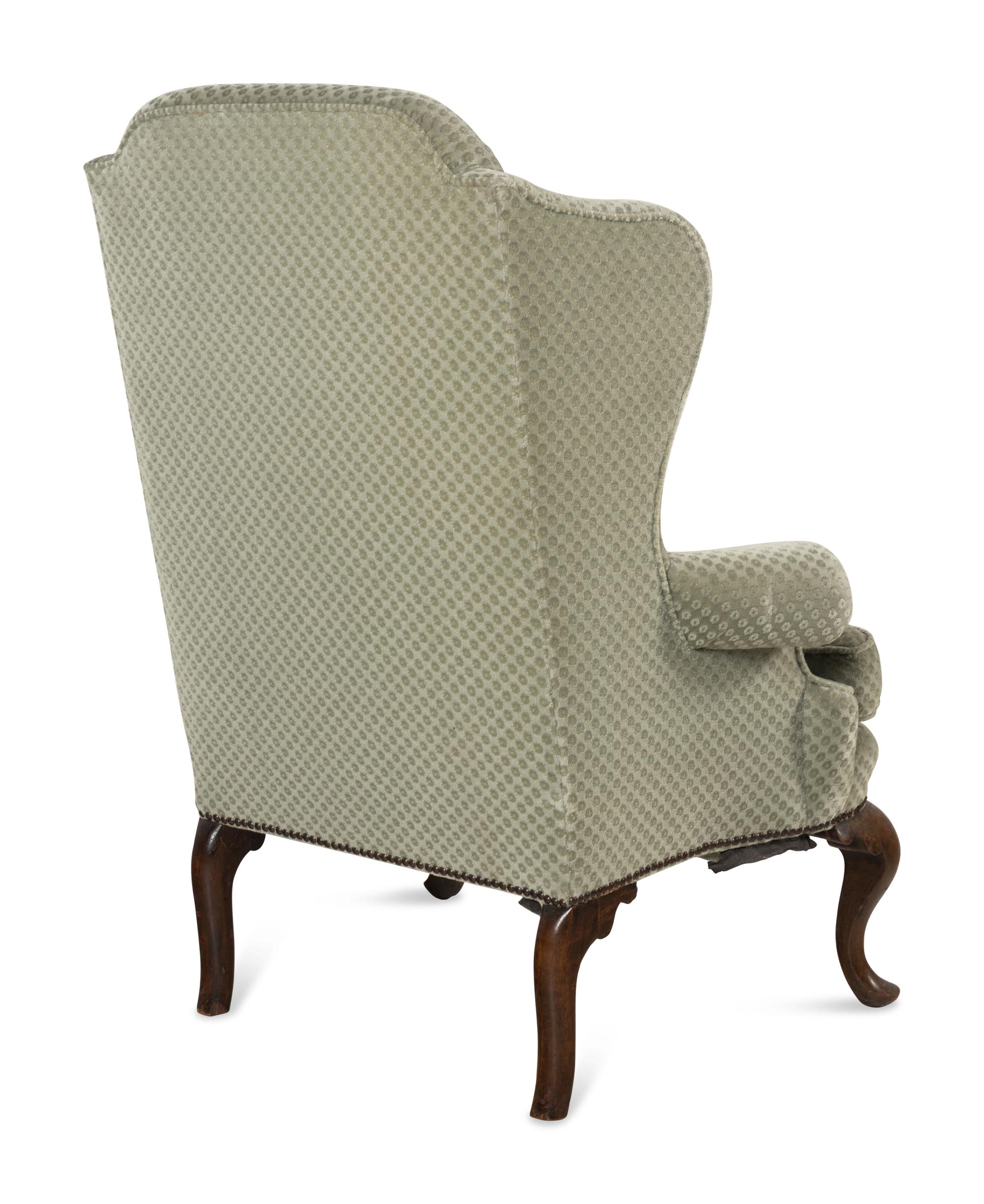 A Queen Anne Style Mahogany Wing-Back Armchair