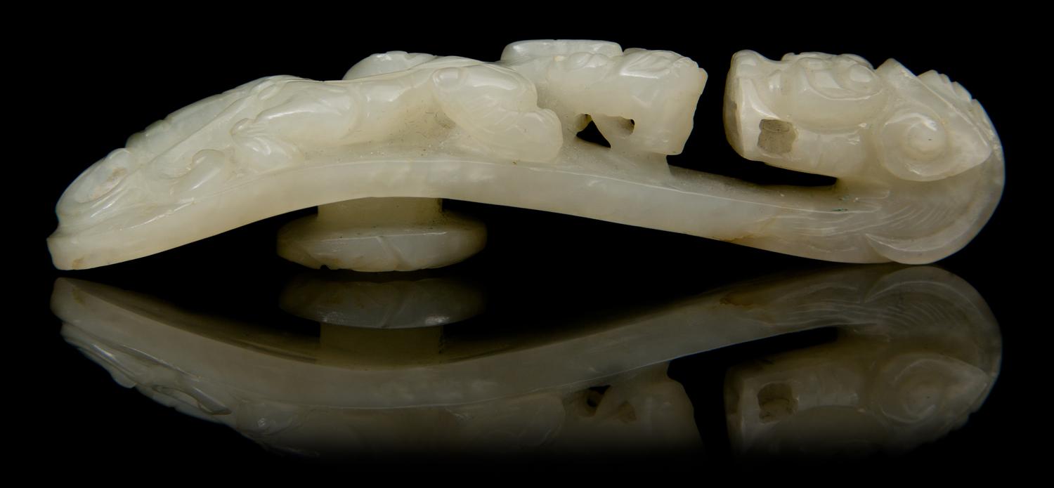 A Carved Jade Belt Hook Length 3 5/8 inches.