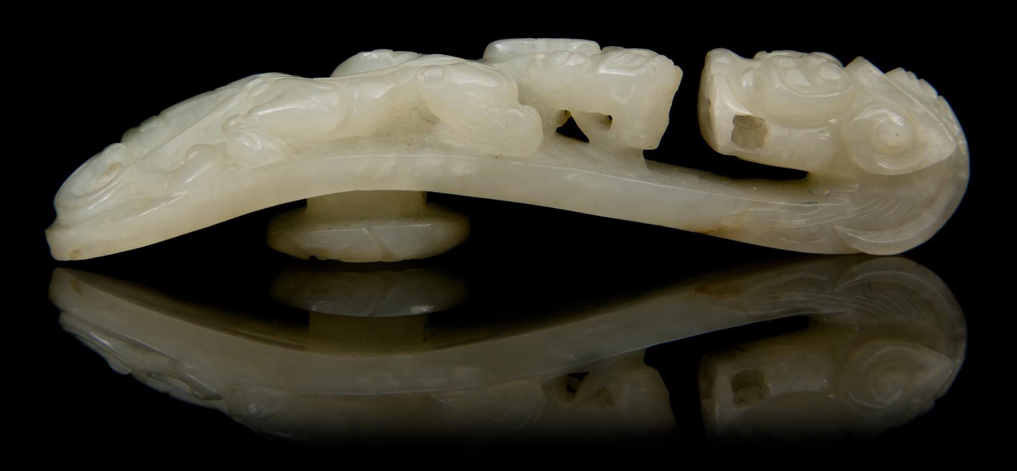 A Carved Jade Belt Hook Length 3 5/8 inches.