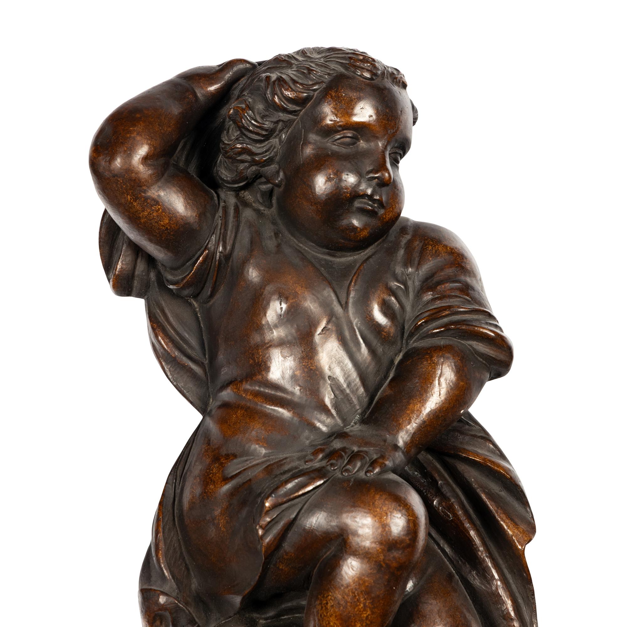 A Pair of Continental Painted Composition Figural Wall Ornaments