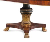 A Regency Style Painted and Parcel Gilt Mahogany Extension Dining Table