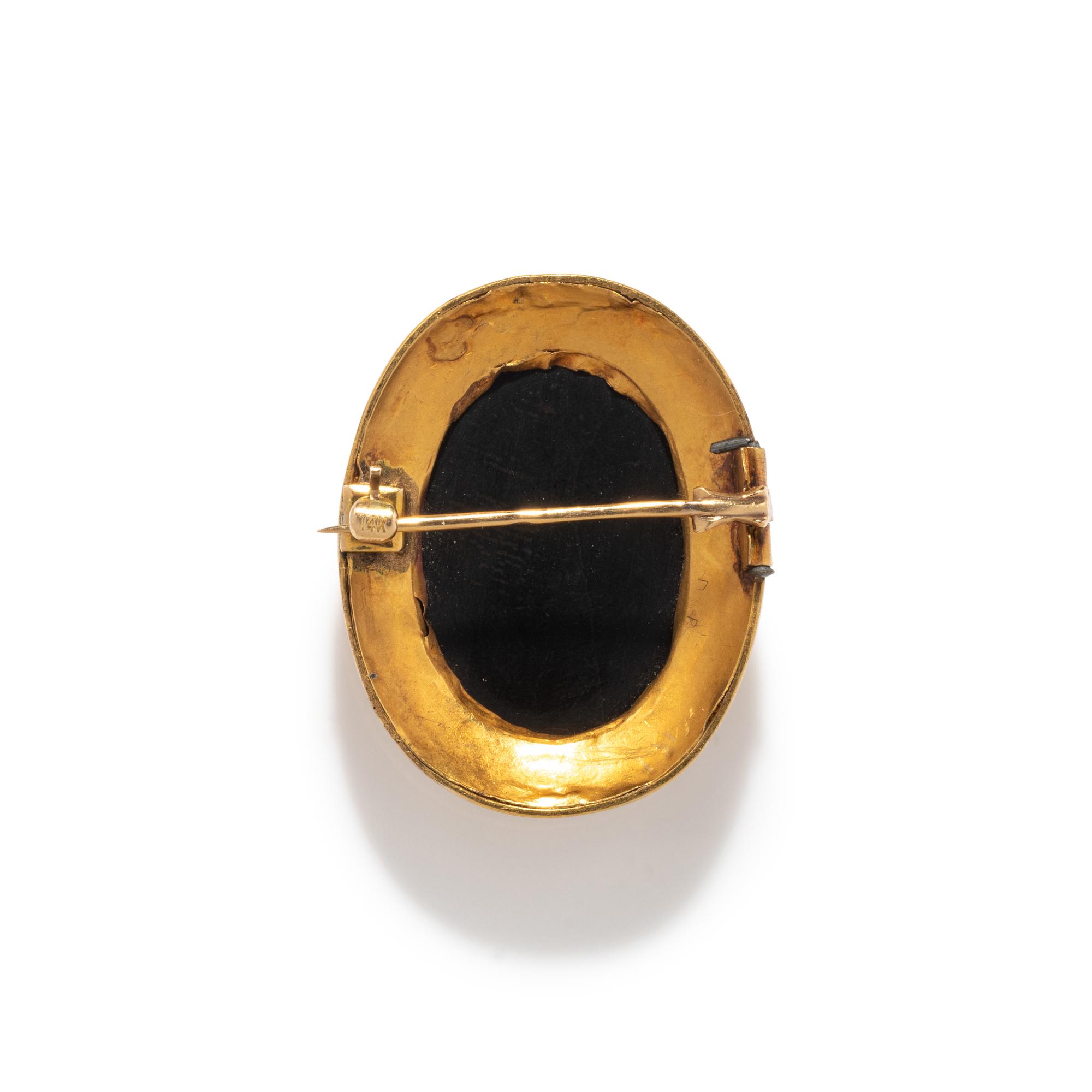 A Neoclassical Gold and Nicolo Brooch with the Family of Aeneas Quitting Troy
