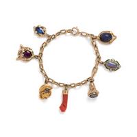 YELLOW GOLD AND GEMSTONE CHARM BRACELET