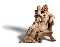 A Neoclassical Terracotta Venus with Eros