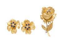 A Collection of 18 Karat Yellow Gold and Diamond Floral Motif Jewelry, 24.70 dwts.
