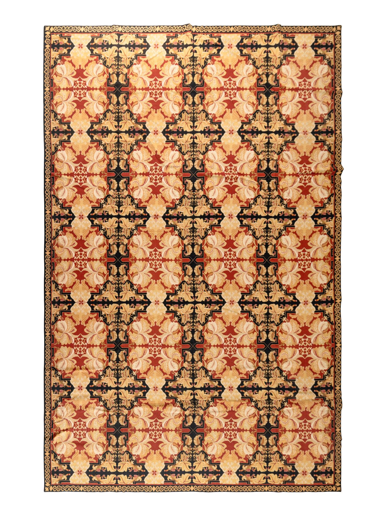 A Large Continental Needlepoint Rug
