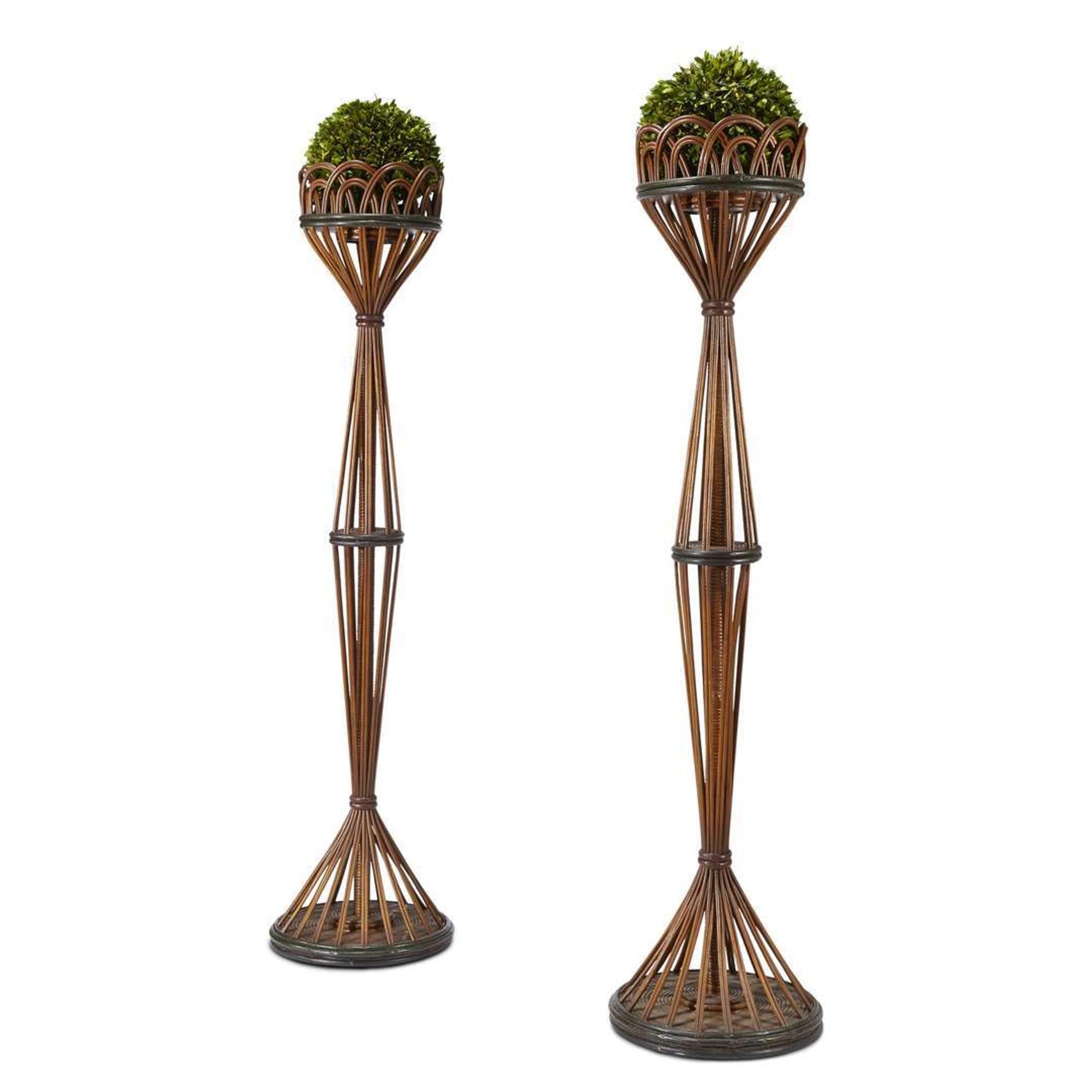 A pair of tall polychrome painted rattan plant stands american, circa 1920