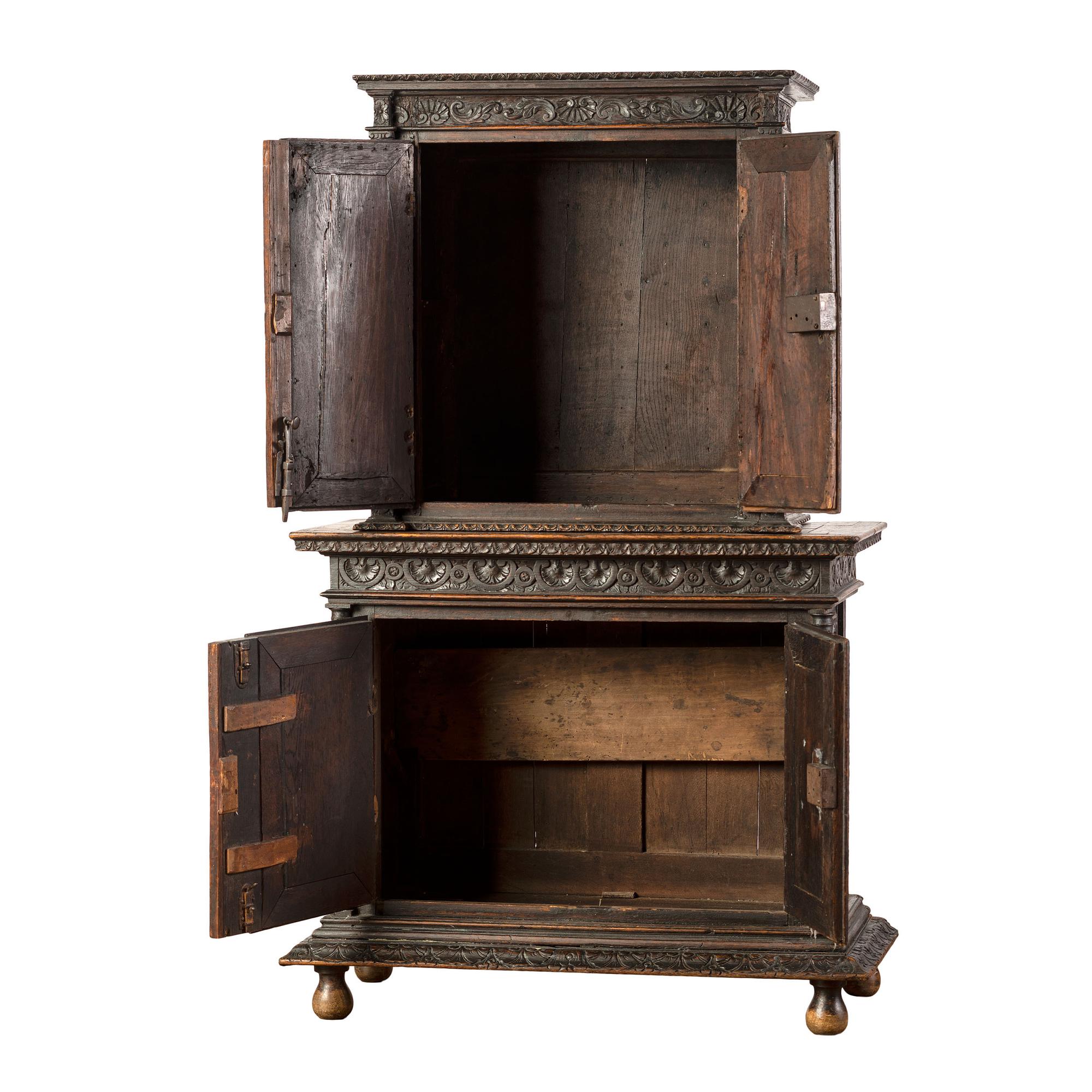 A John Scott Bradstreet & Co. Gothic Revival Carved Oak Cupboard