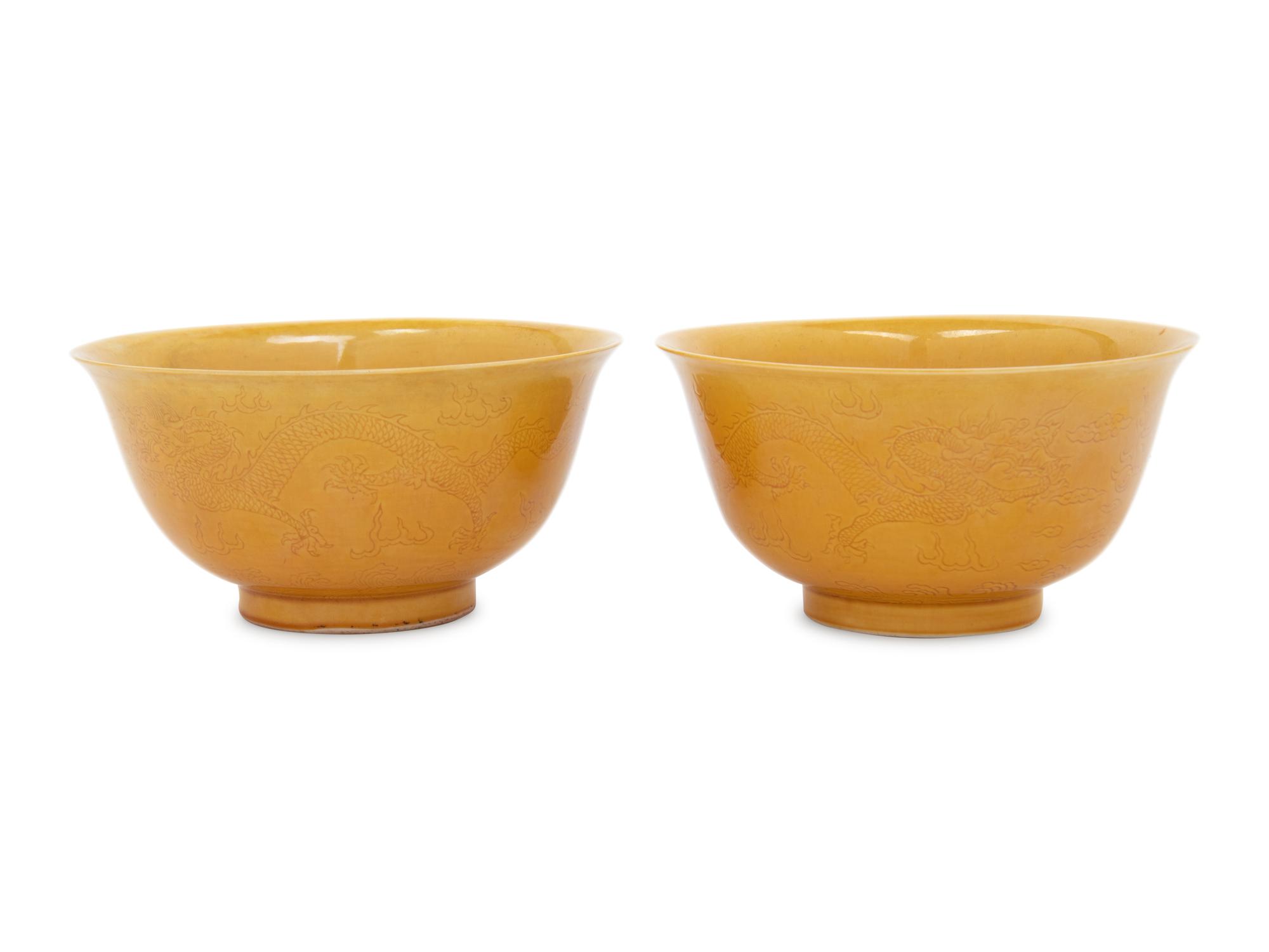 A Pair of Incised Yellow Glazed Porcelain 'Dragon' Bowls