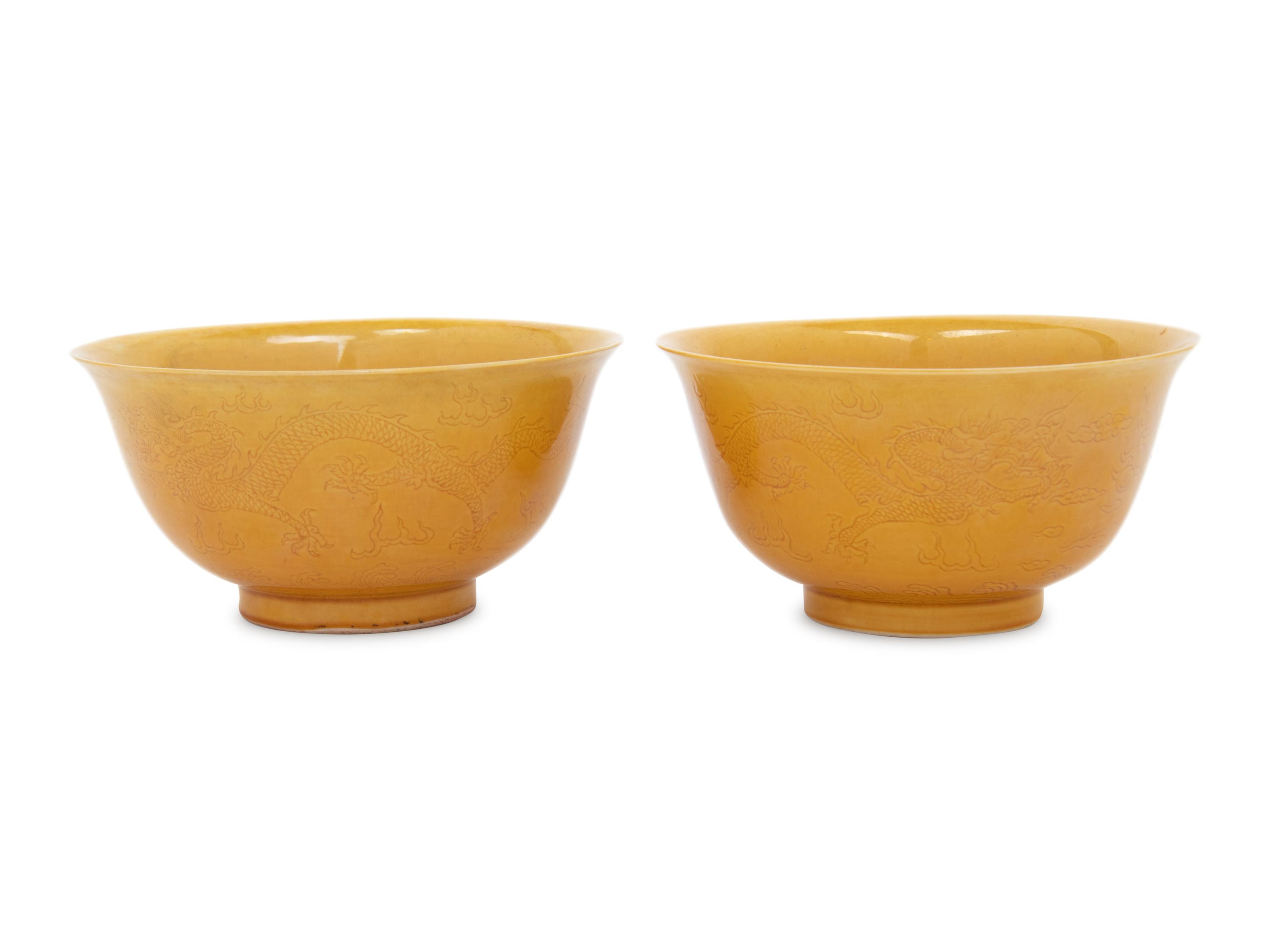 A Pair of Incised Yellow Glazed Porcelain 'Dragon' Bowls