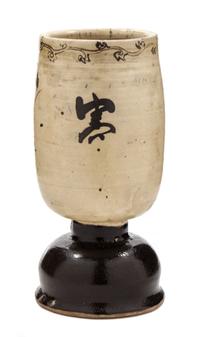A Cizhou Stoneware Stem Vessel Height 9 1/2 inches.