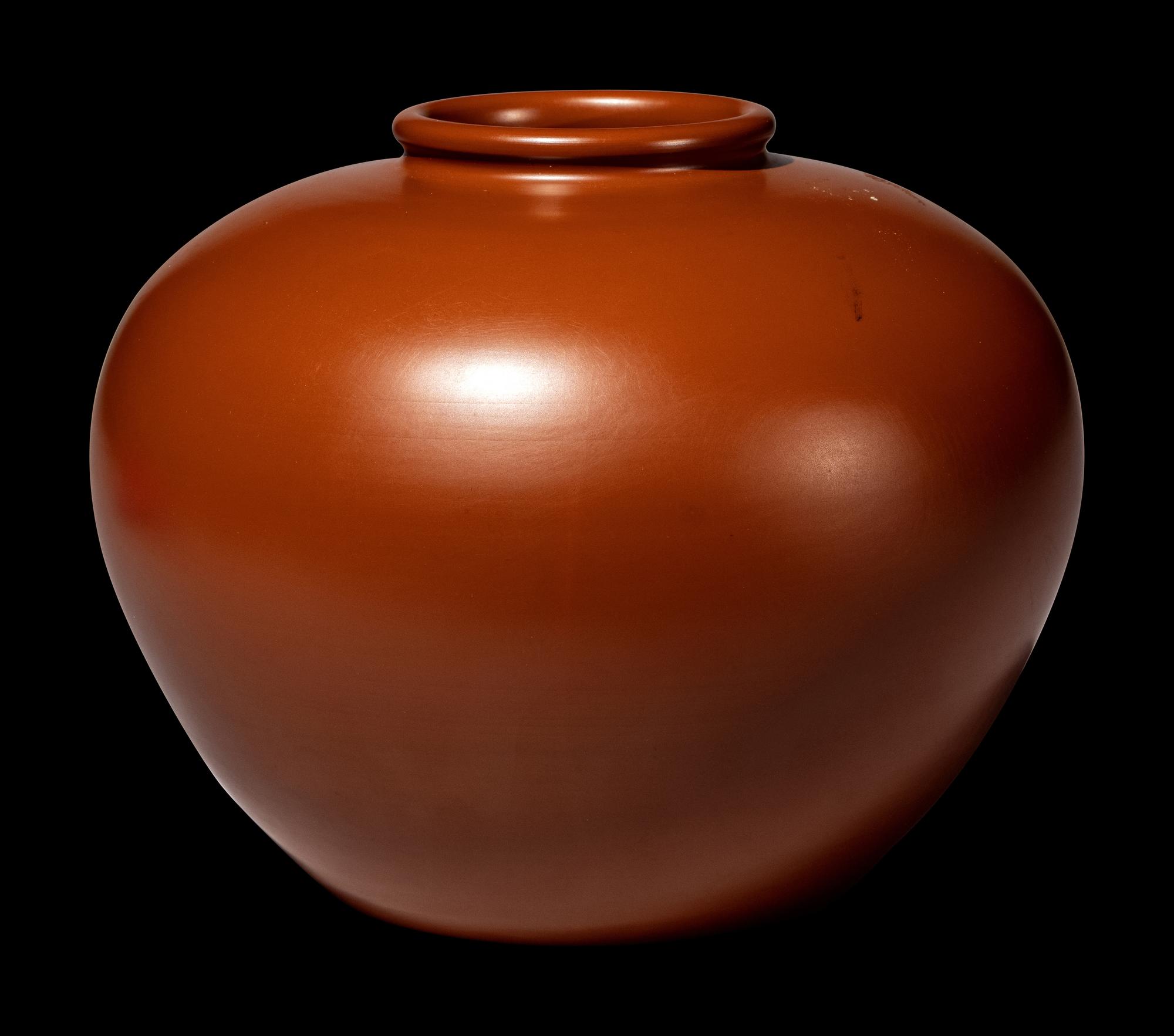 A Japanese Persimmon Glazed Pottery 'Landscape' Jar