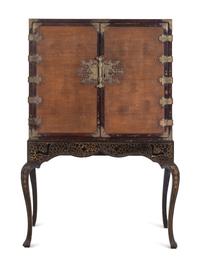 A Chinese Export Gilt Decorated Lacquer Cabinet on Stand