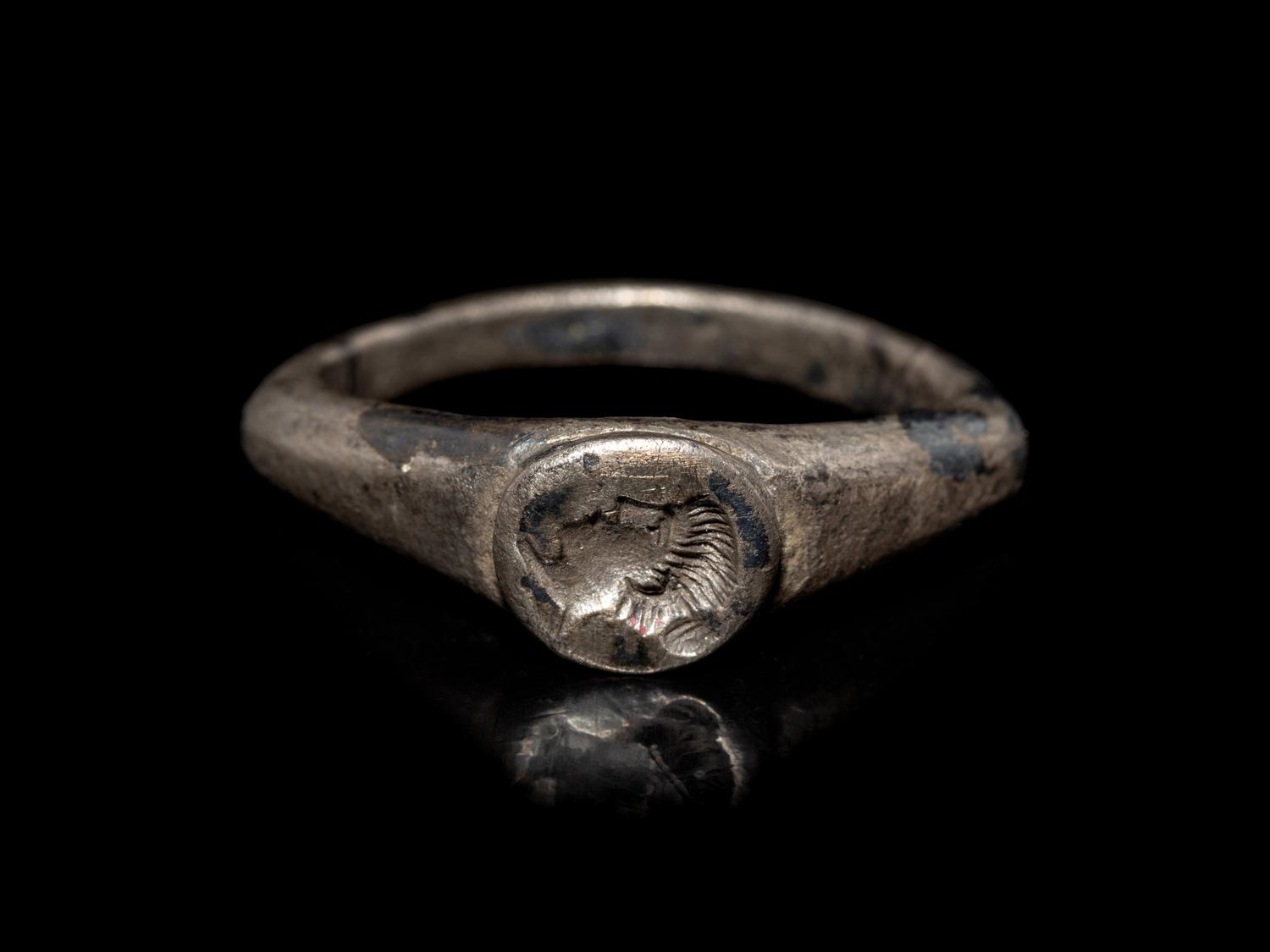 A Roman Silver Finger Ring with a Portrait Bust of a Woman