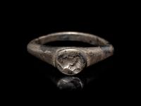 A Roman Silver Finger Ring with a Portrait Bust of a Woman