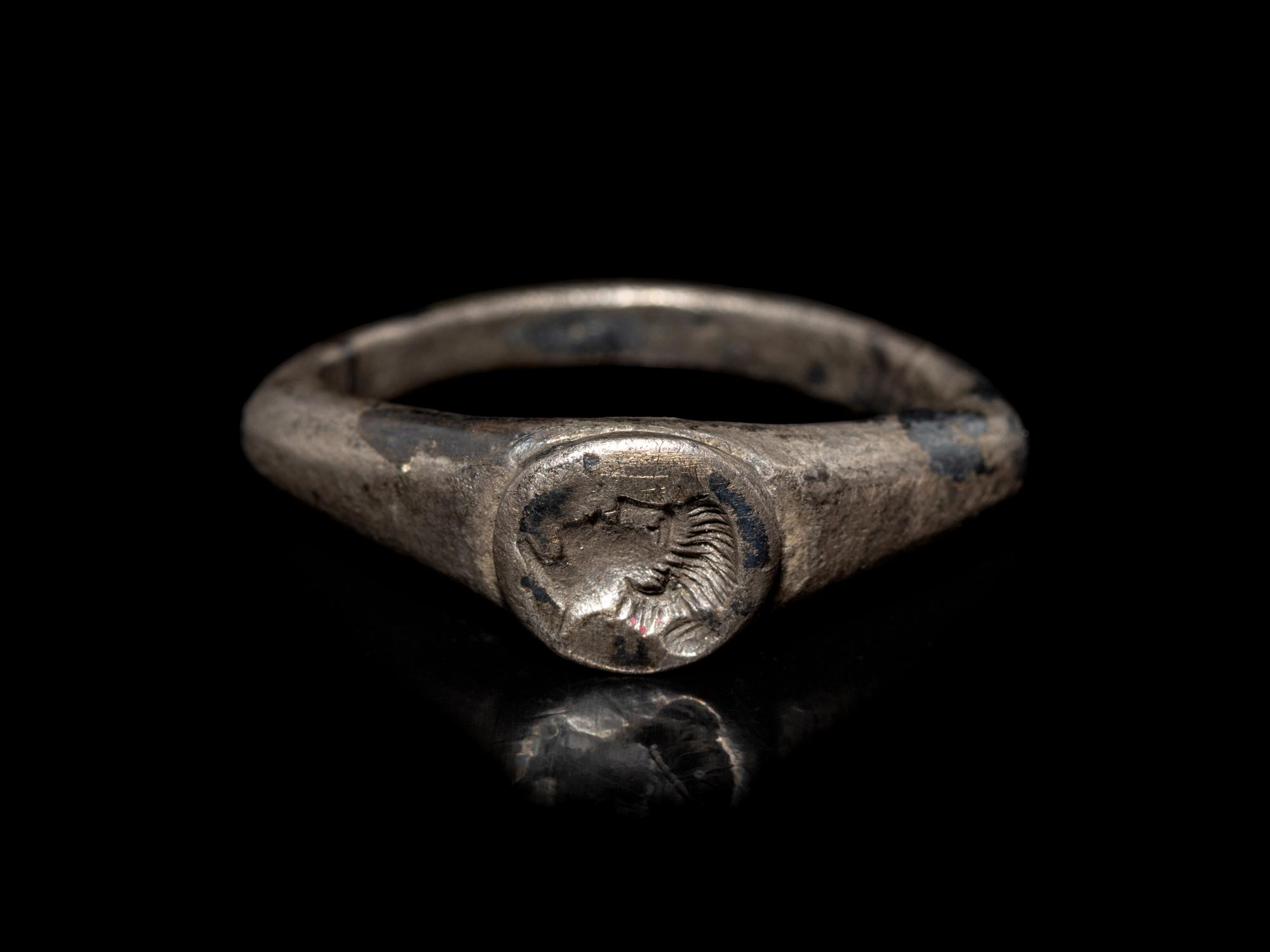 A Roman Silver Finger Ring with a Portrait Bust of a Woman