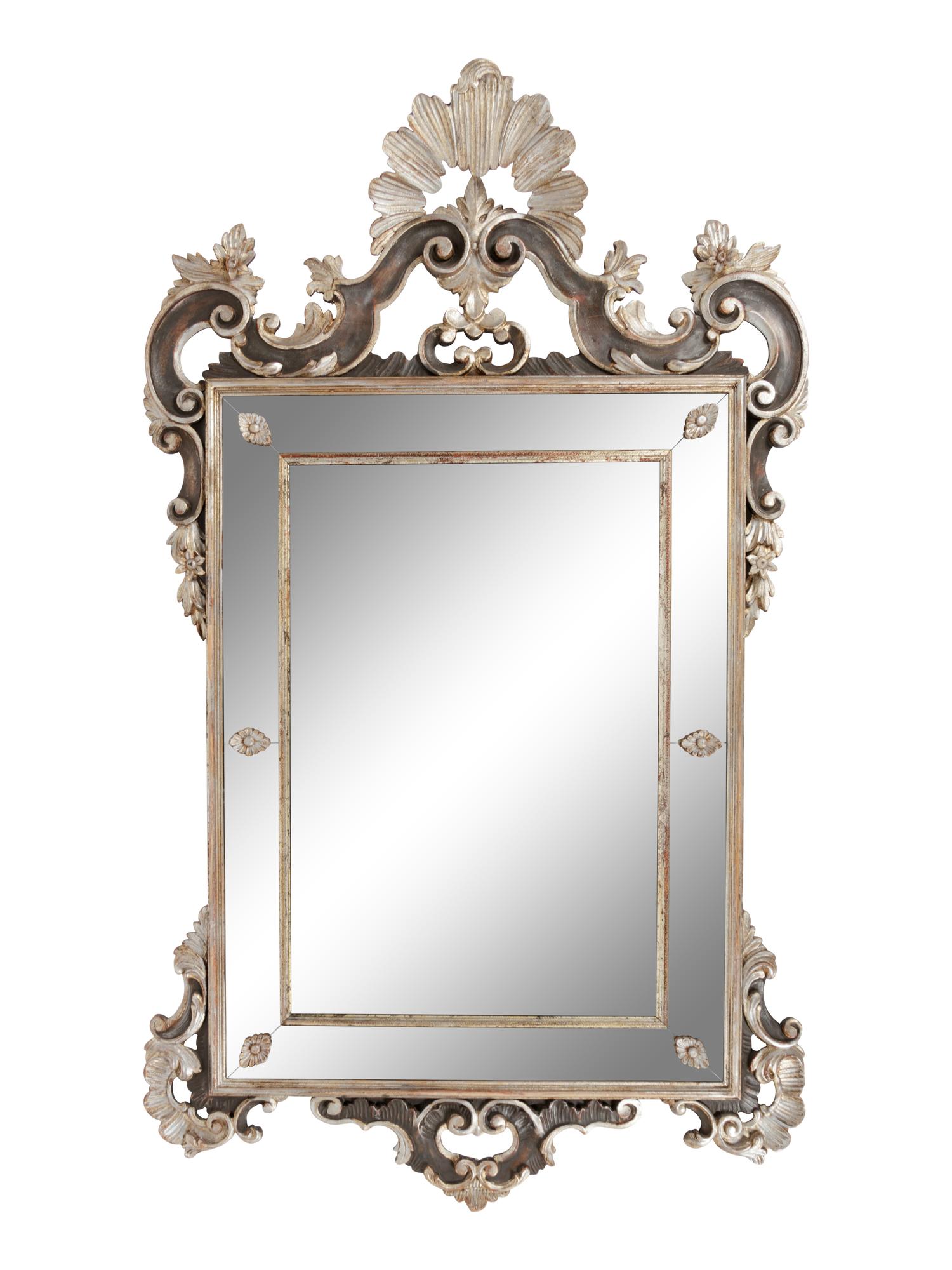 An Italian Baroque Style Silvered Wood Mirror