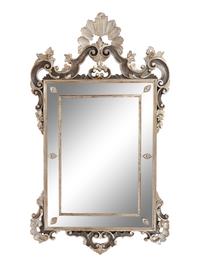 An Italian Baroque Style Silvered Wood Mirror