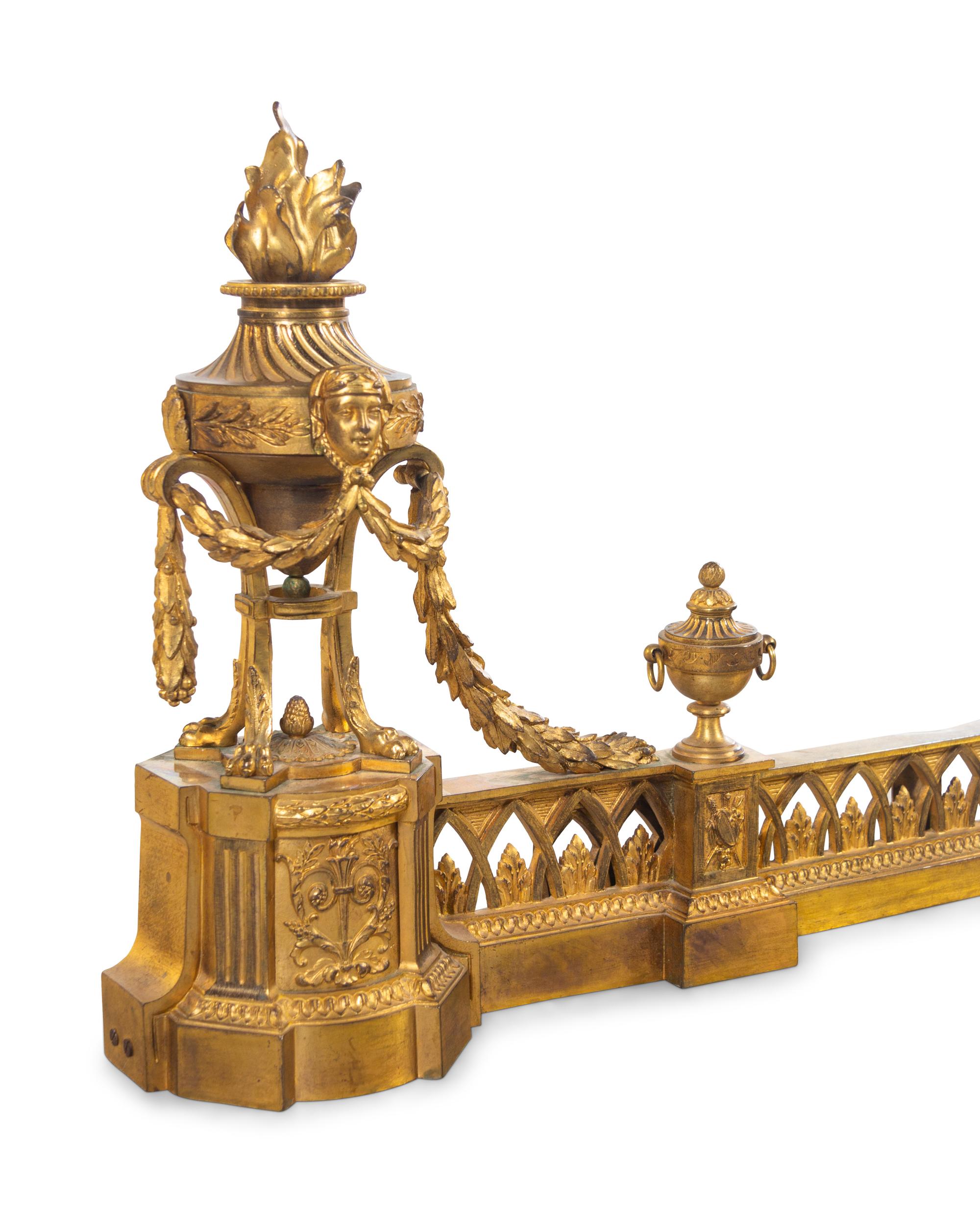 A Louis XVI Style Gilt Bronze Fire Fender with Flaming Urns