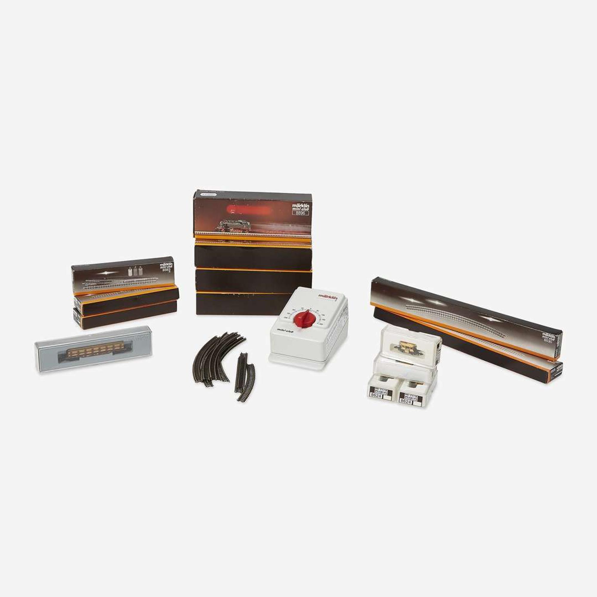 An eighteen karat gold, diamond, and synthetic gemstone model train No. 12, Halberstadt Märklin