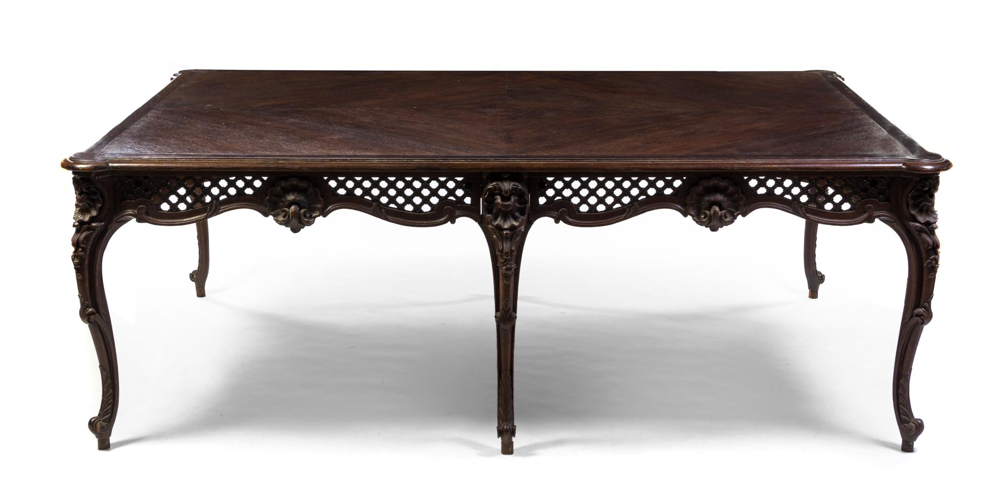 A French Provincial Carved Oak Dining Table, J. Sarazin, Height 31 1/4 x width 88 x depth 60 inches.