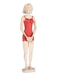 A Carved and Painted Wood Figure of a Bather