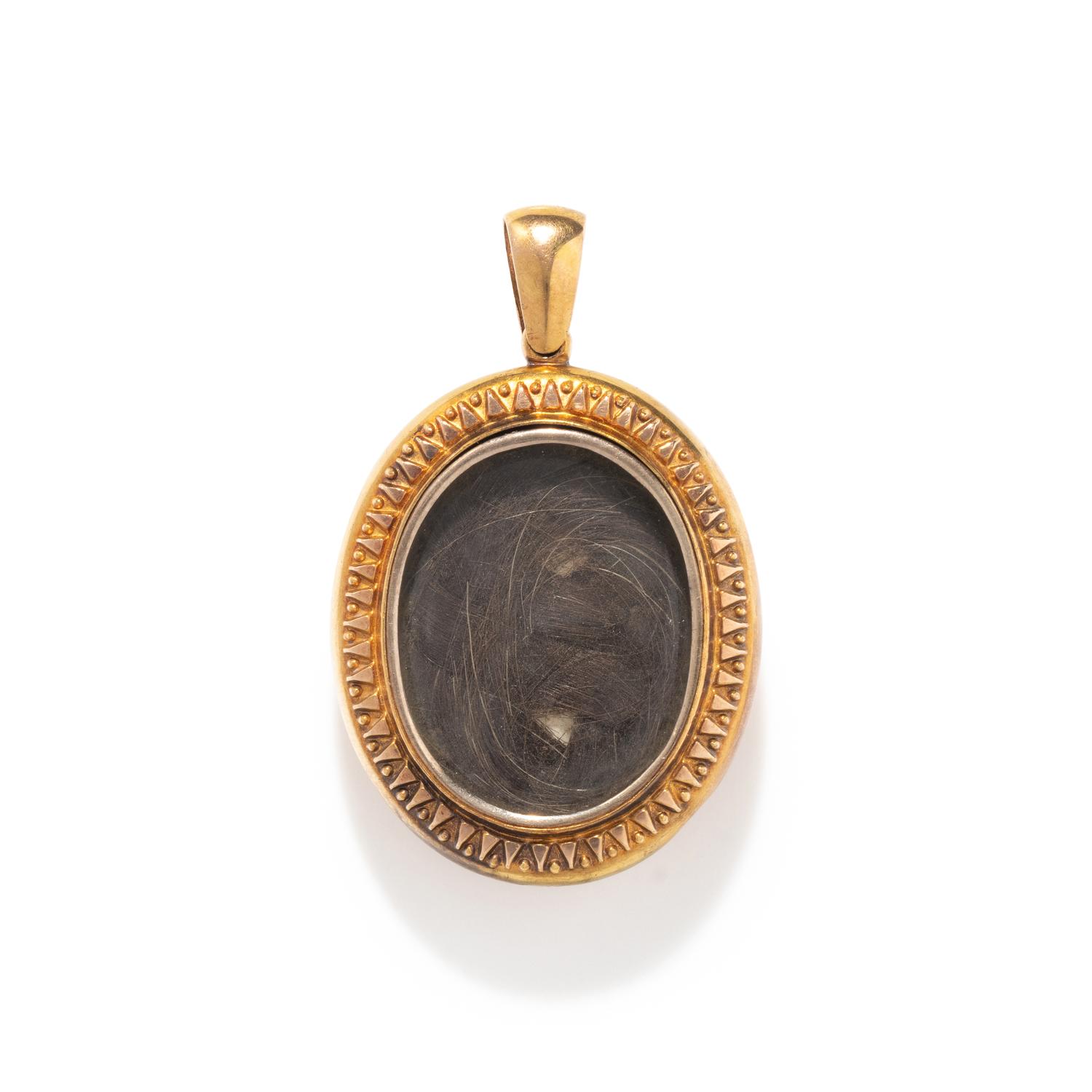 A Neoclassical Black Onyx Intaglio with a Female Portrait Head on a Gold Mourning Locket Pendant