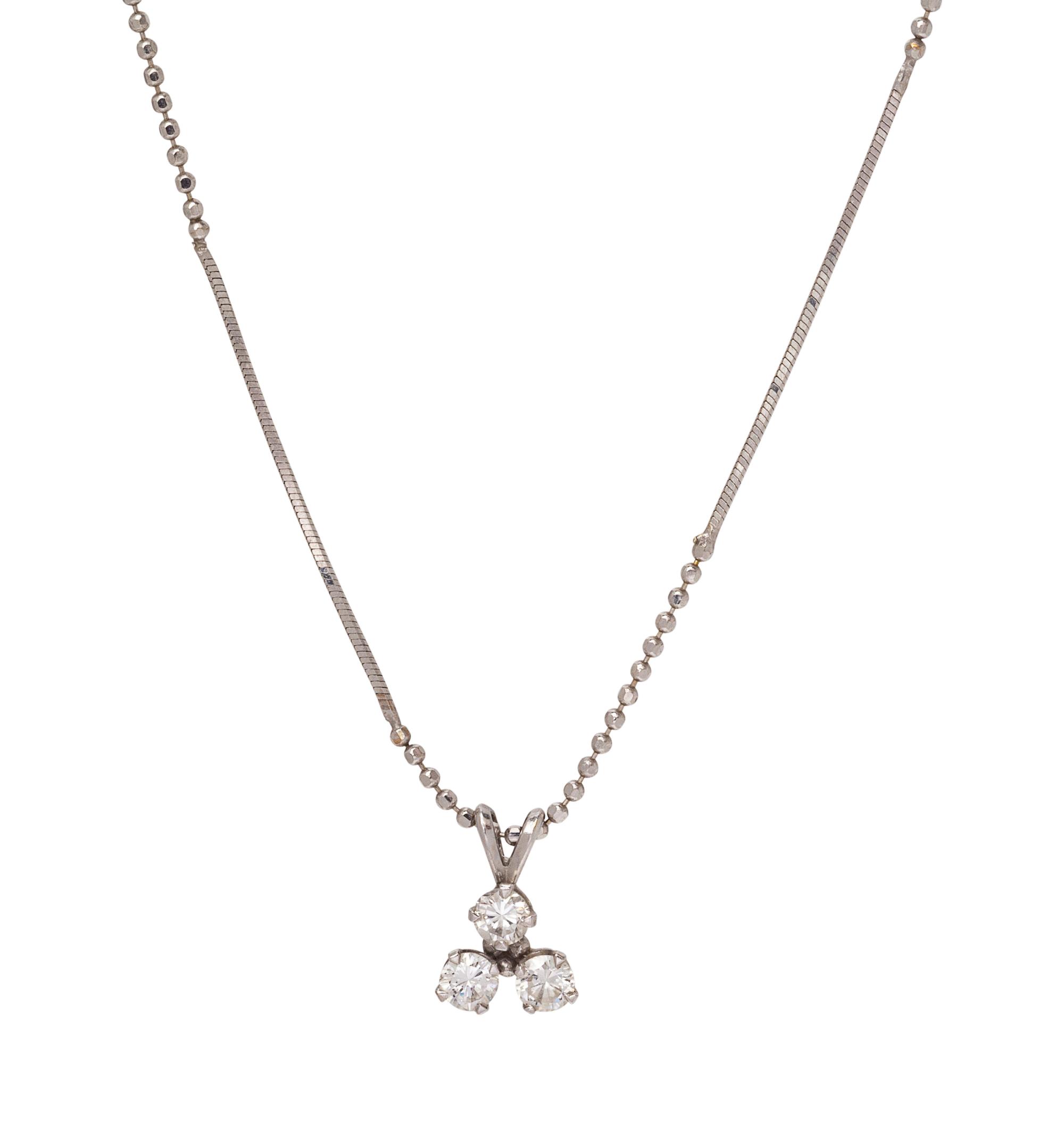 A White Gold and Diamond Pendant/Necklace,